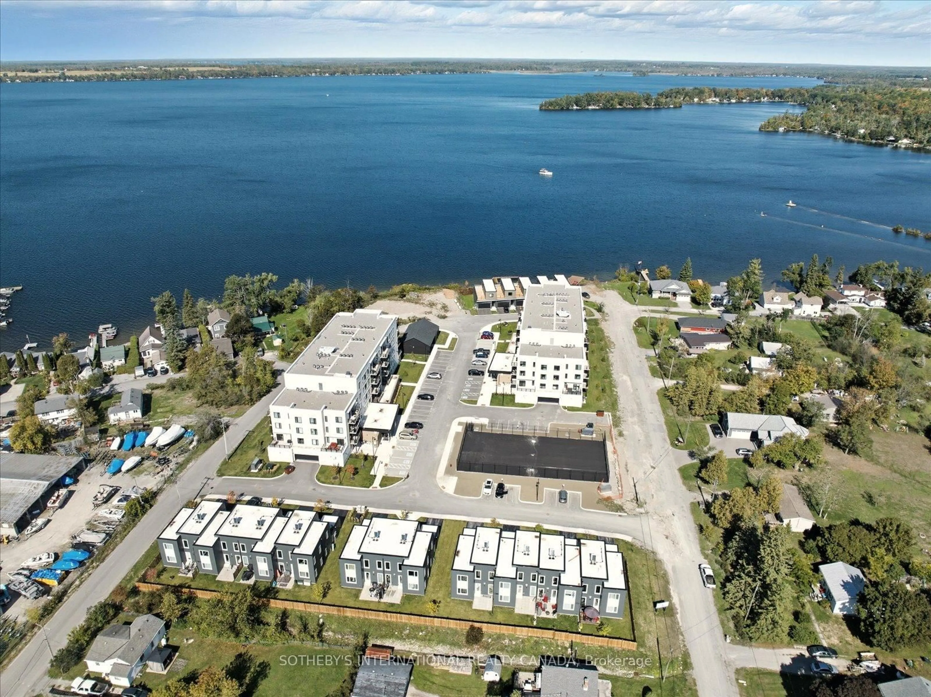 A pic from outside/outdoor area/front of a property/back of a property/a pic from drone, water/lake/river/ocean view for 19A West St #Penthouse 1, Kawartha Lakes Ontario K0M 1N0