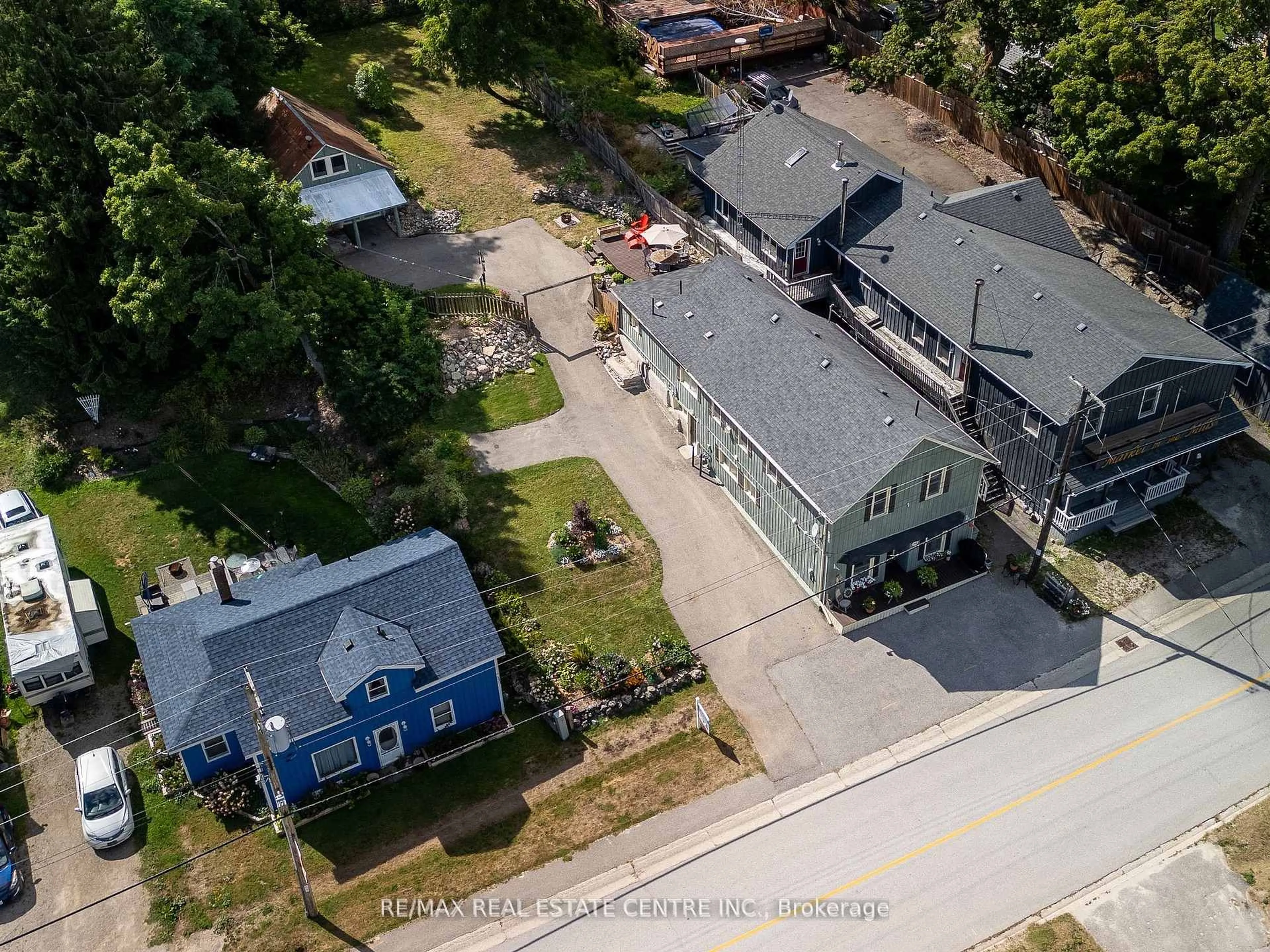 A pic from outside/outdoor area/front of a property/back of a property/a pic from drone, street for 160 Main St, Melancthon Ontario L0N 1J0