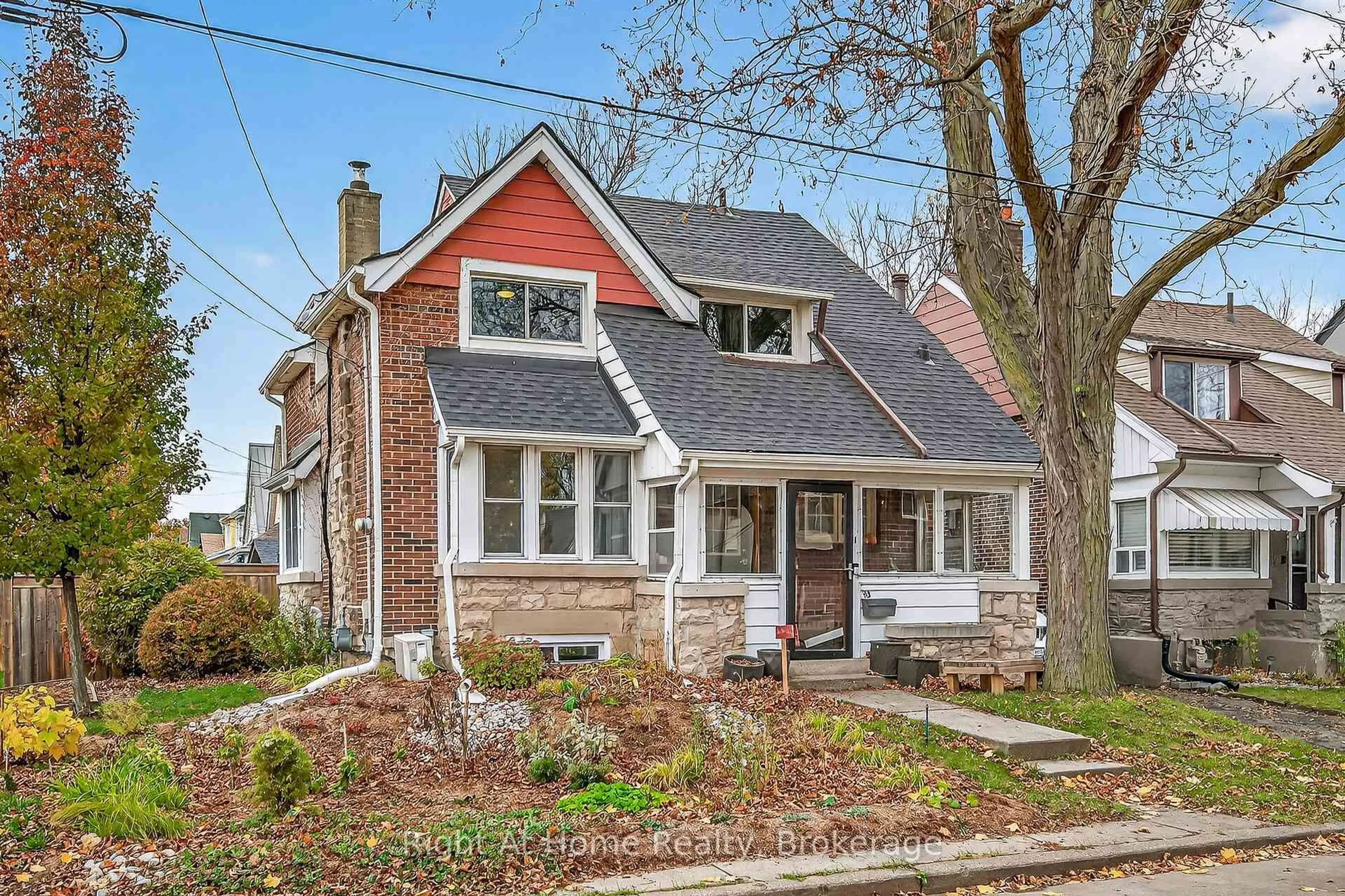 Home with brick exterior material, street for 93 Paradise Rd, Hamilton Ontario L8S 3S9