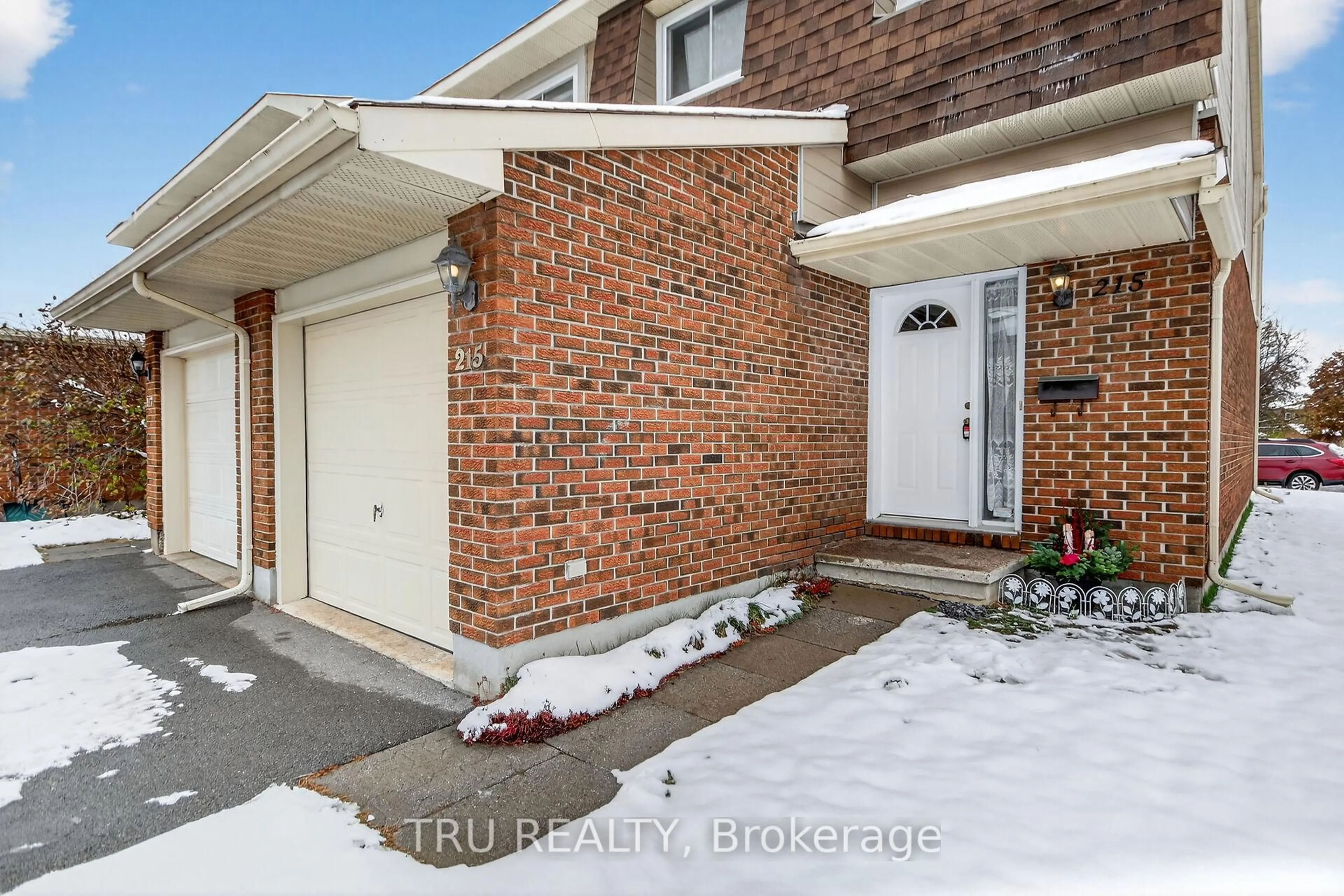 Home with brick exterior material, street for 215 Temby Private #82, Ottawa Ontario K1T 2W1
