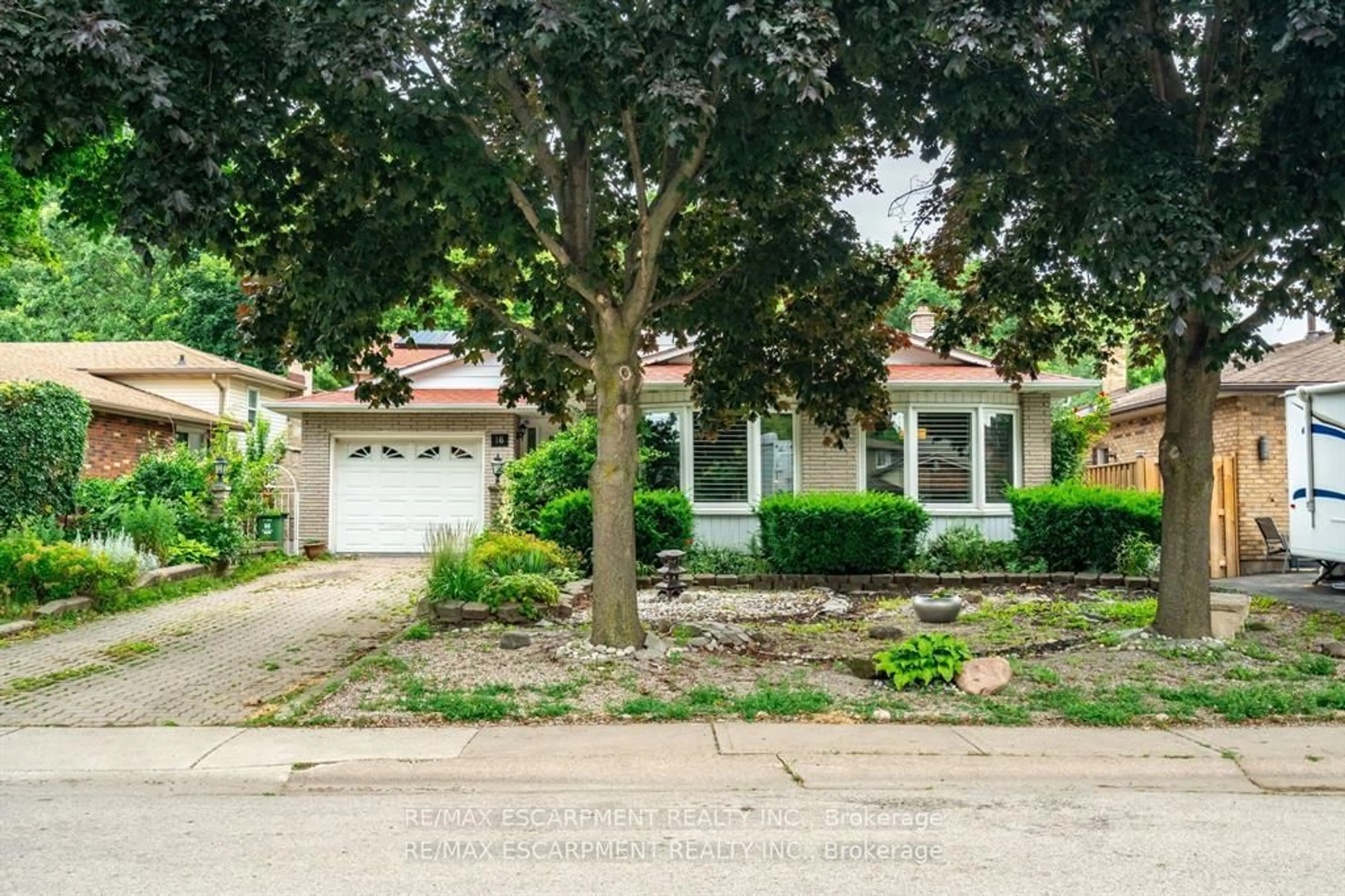 Home with brick exterior material, street for 16 Flamingo Dr, Hamilton Ontario L9A 4X7