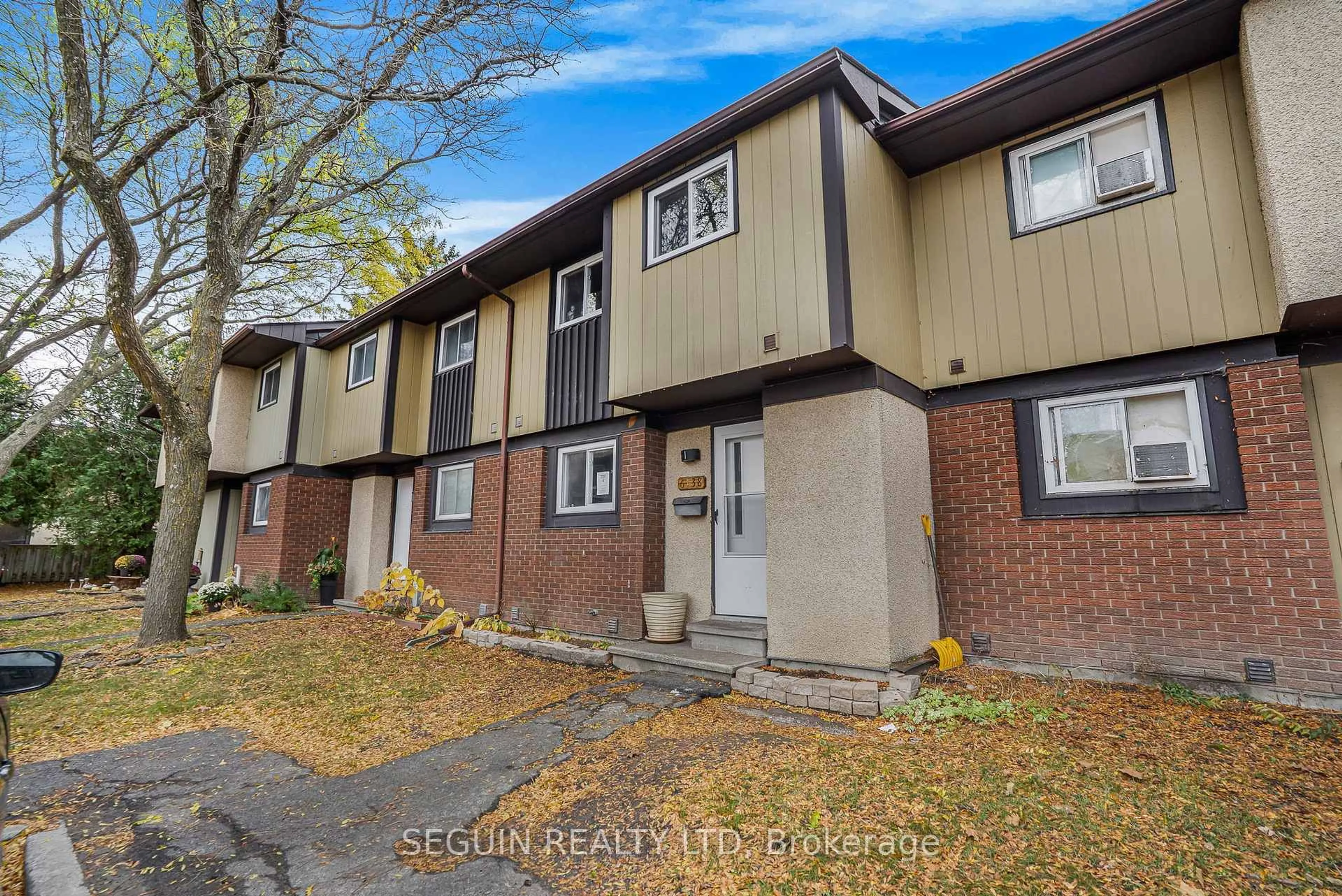 Home with vinyl exterior material, street for 6138 Brookside Lane, Orleans Ontario K1C 2K7