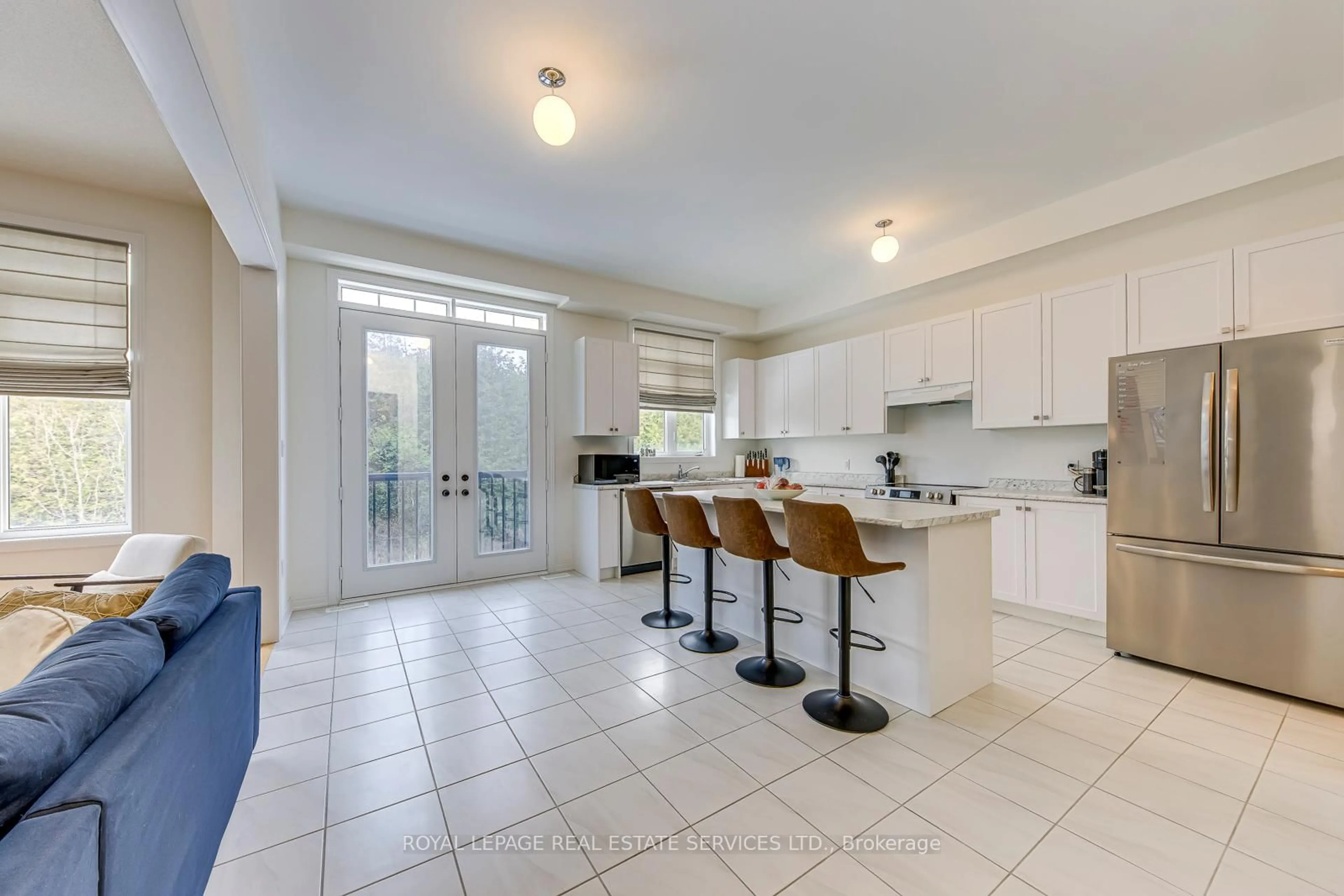 Open concept kitchen, ceramic/tile floor for 116 Limestone Lane, Shelburne Ontario L9V 3Y4