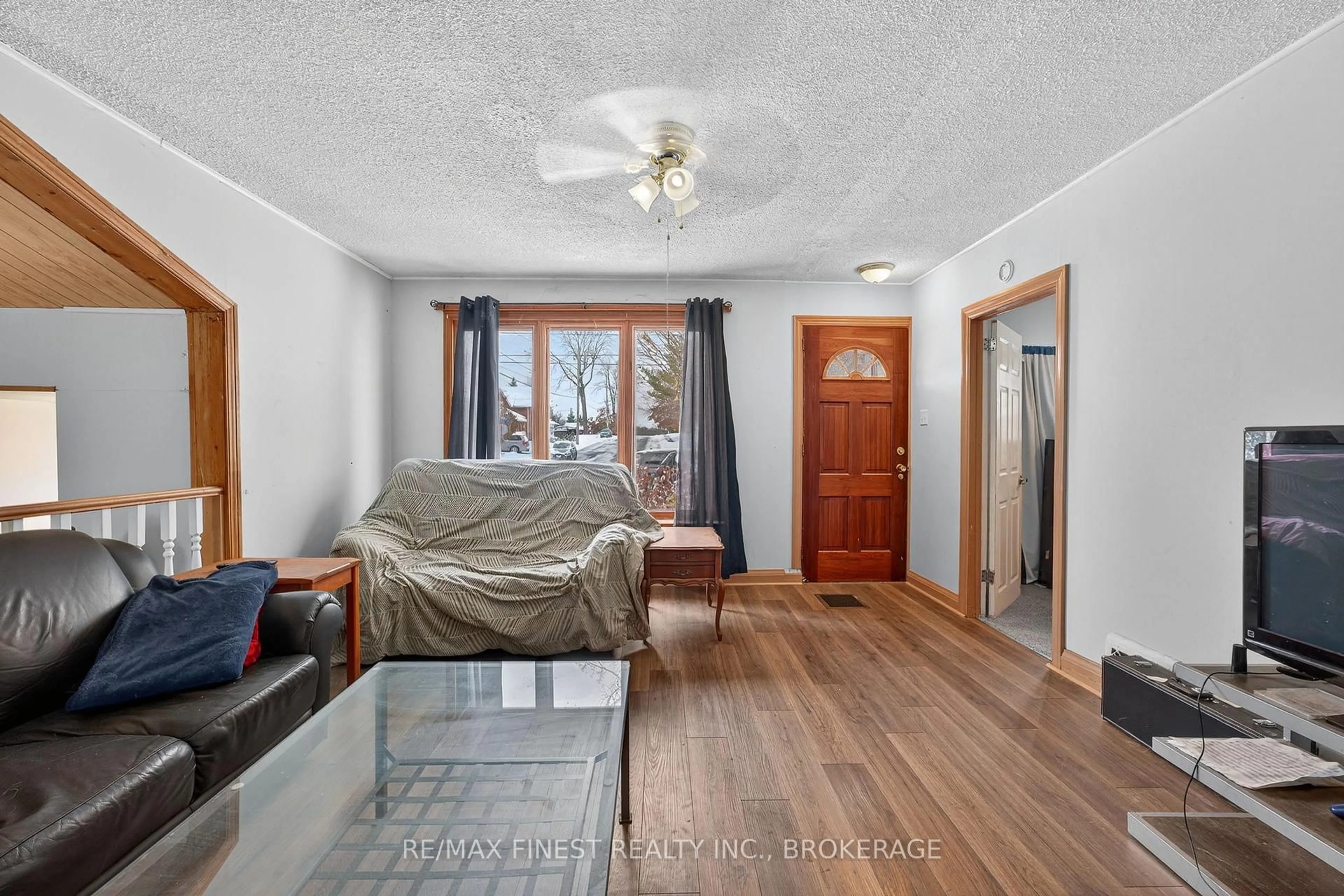 Living room with furniture, wood/laminate floor for 161 Thomas St, Greater Napanee Ontario K7R 2H4