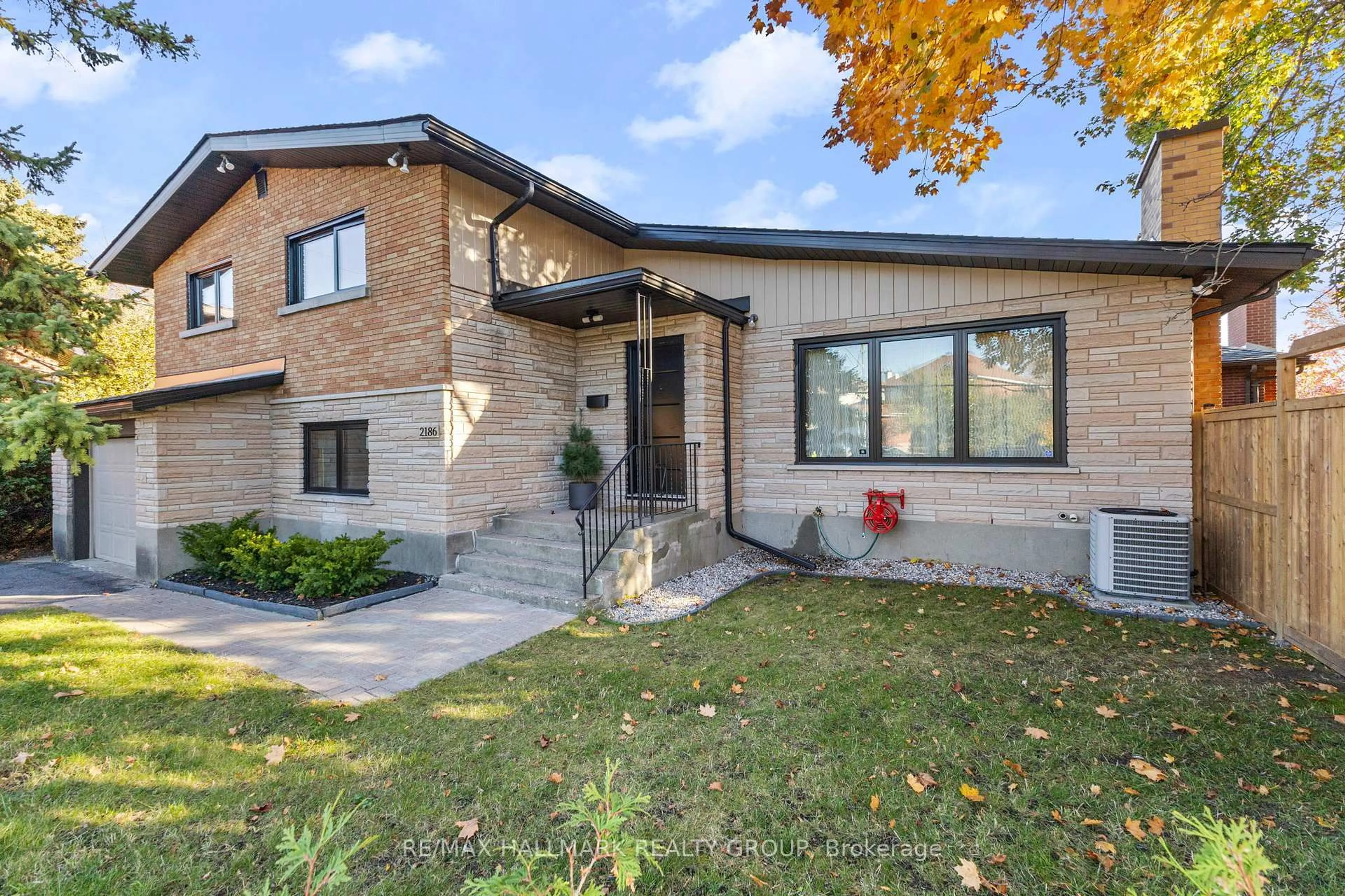 Home with brick exterior material, street for 2186 Lenester Ave, Ottawa Ontario K2A 1L4