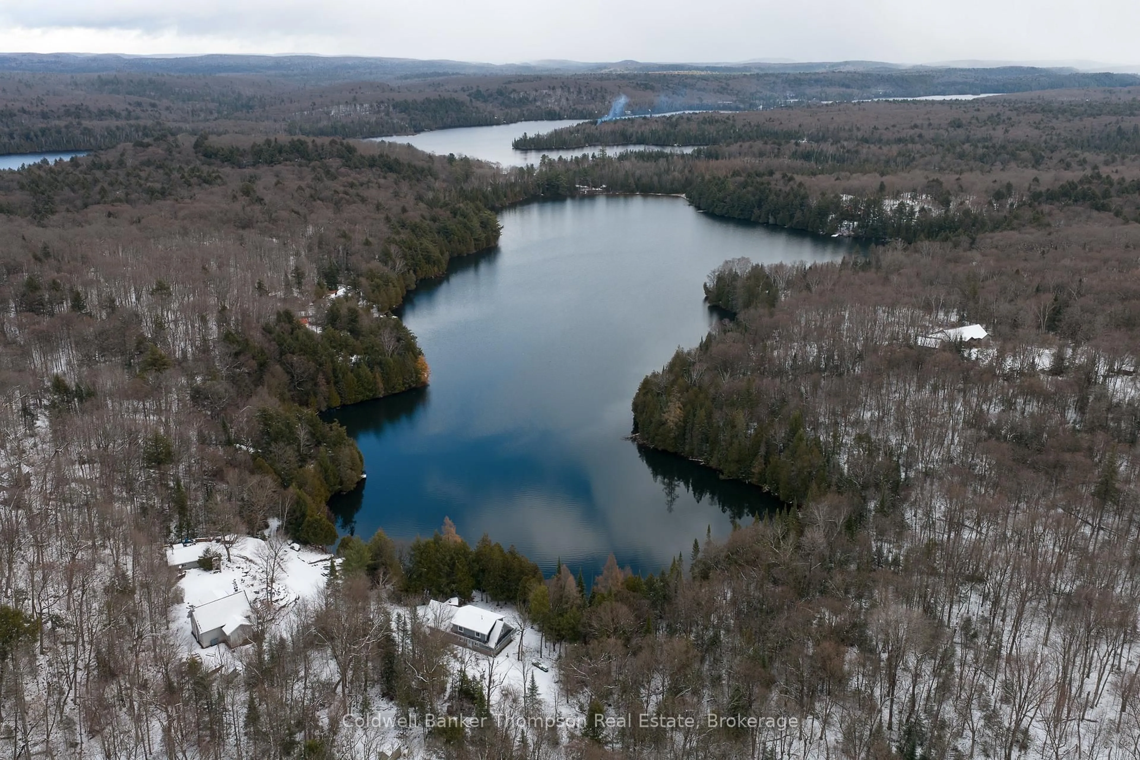 A pic from outside/outdoor area/front of a property/back of a property/a pic from drone, water/lake/river/ocean view for 1030 Brooks Lake Rd, Lake of Bays Ontario P1H 2J6