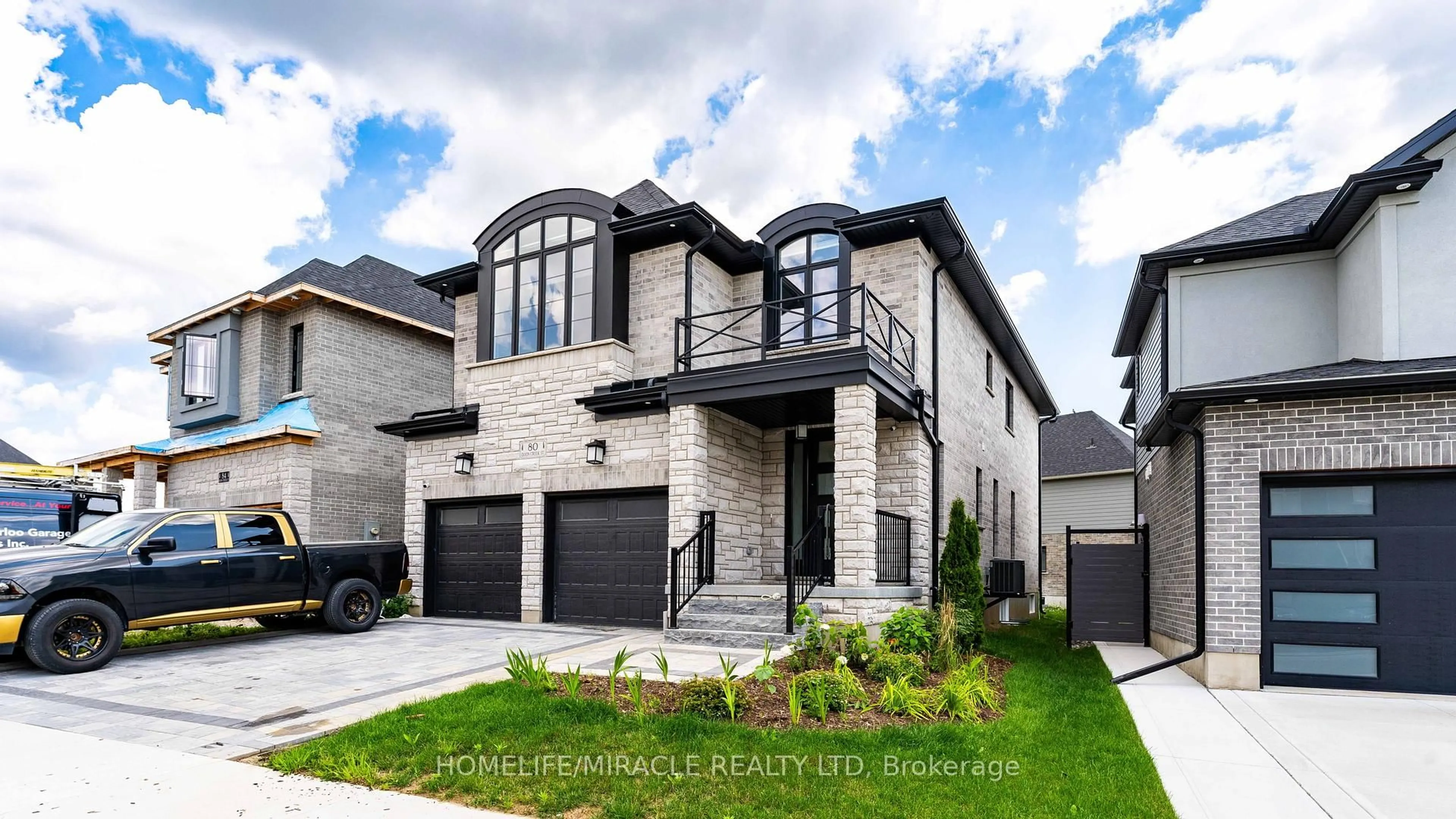 Home with brick exterior material, street for 80 Doon Creek St, Kitchener Ontario N2R 0M3