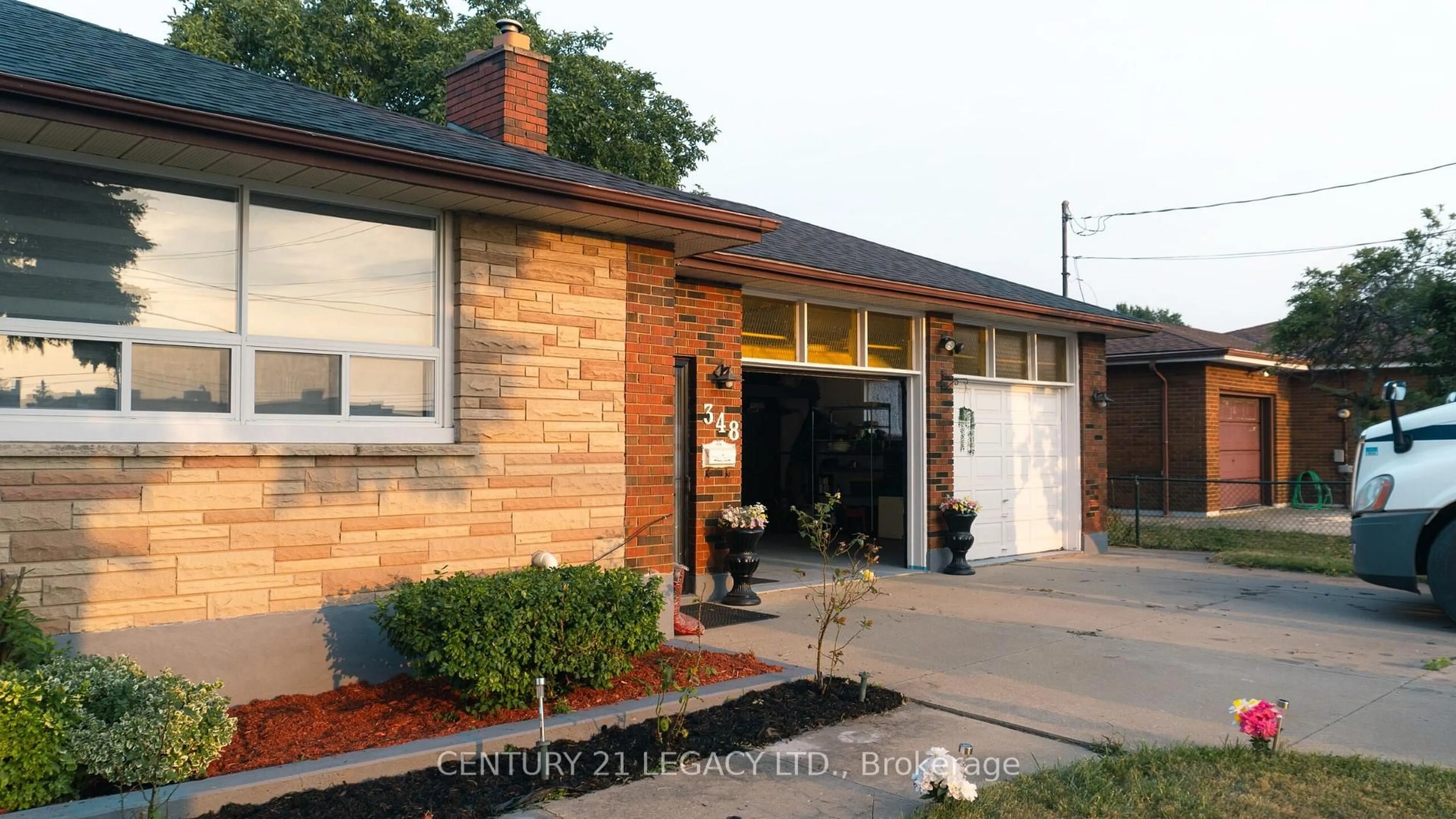 Home with brick exterior material, street for 348 Millen Rd, Hamilton Ontario L8E 2H2