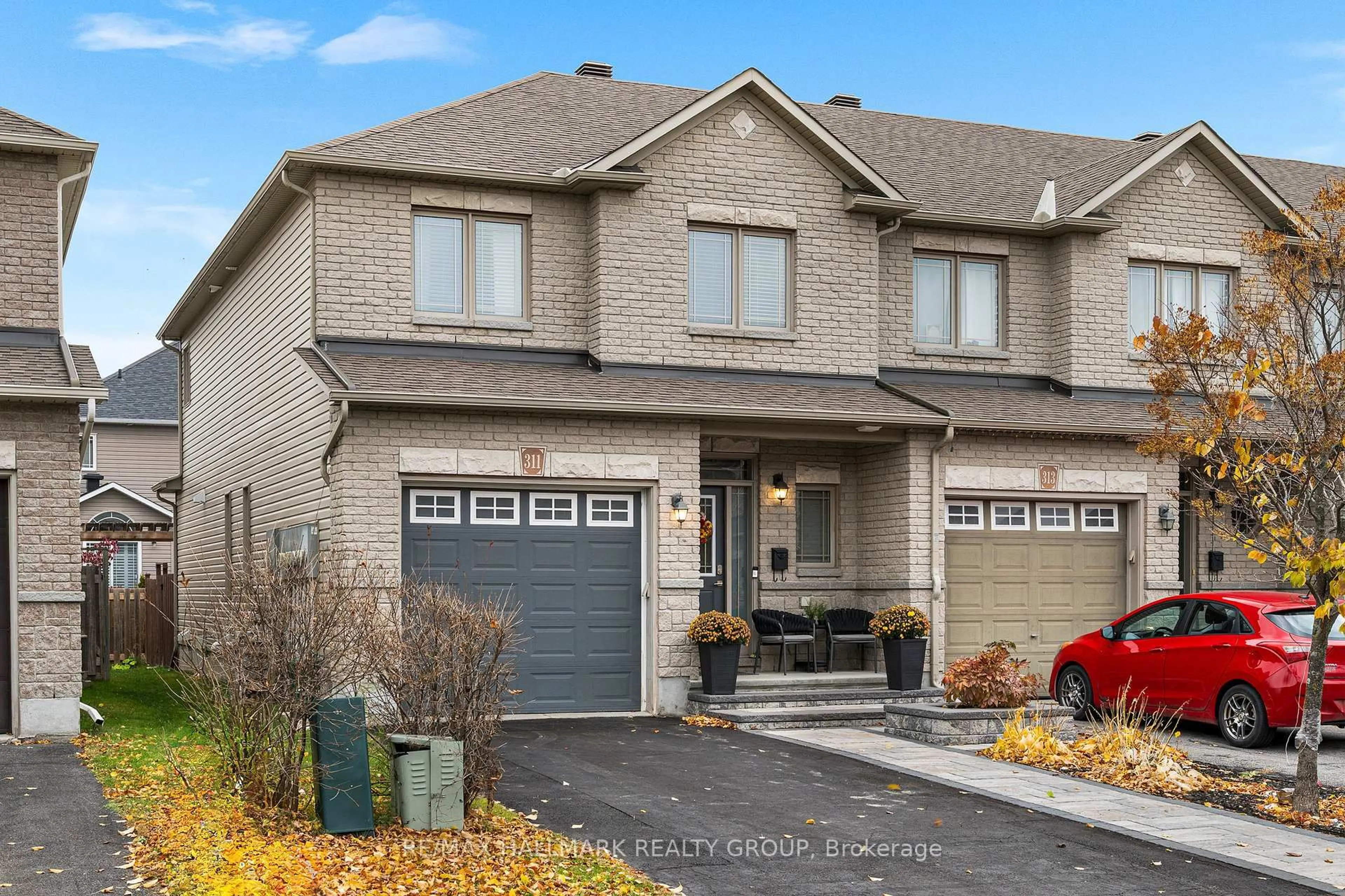 Home with brick exterior material, street for 311 TRAVIS St, Ottawa Ontario K1W 0E5