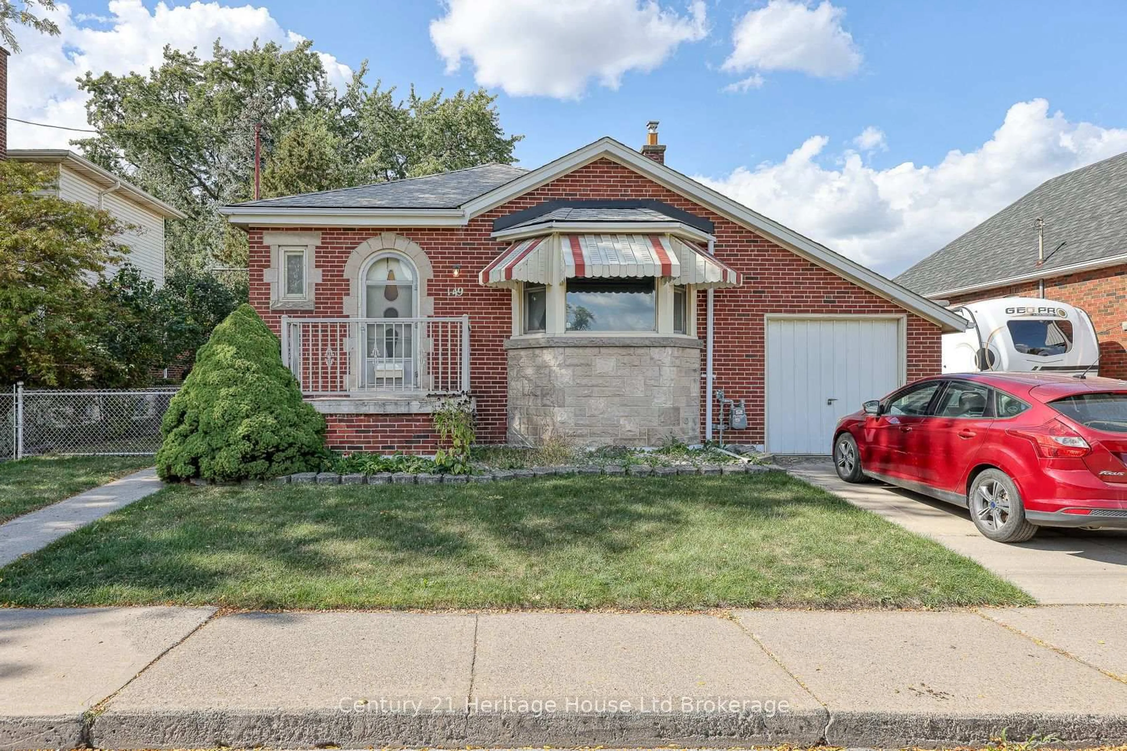 Home with brick exterior material, street for 149 Strathearne Ave, Hamilton Ontario L8H 5K7