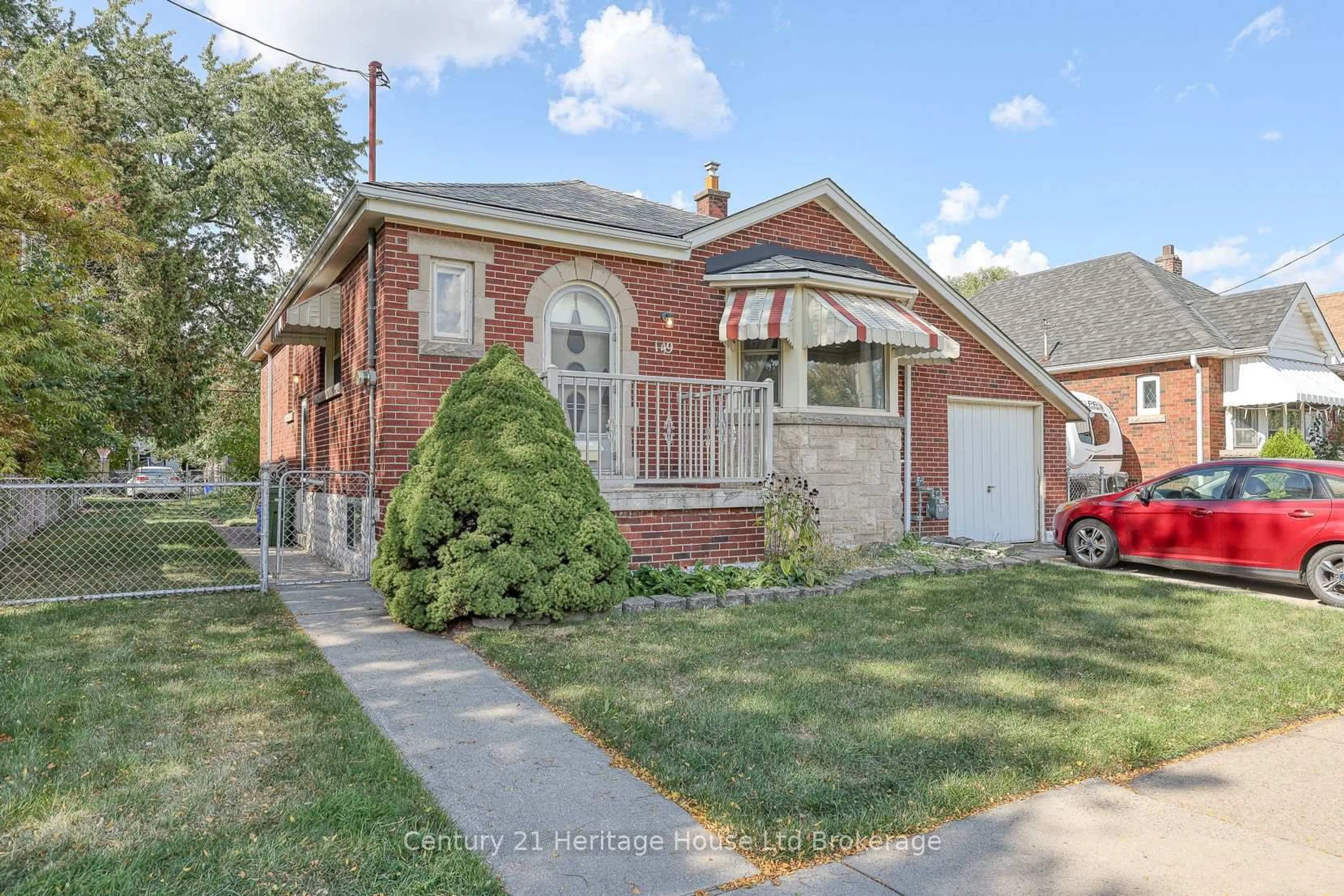 Home with brick exterior material, street for 149 Strathearne Ave, Hamilton Ontario L8H 5K7