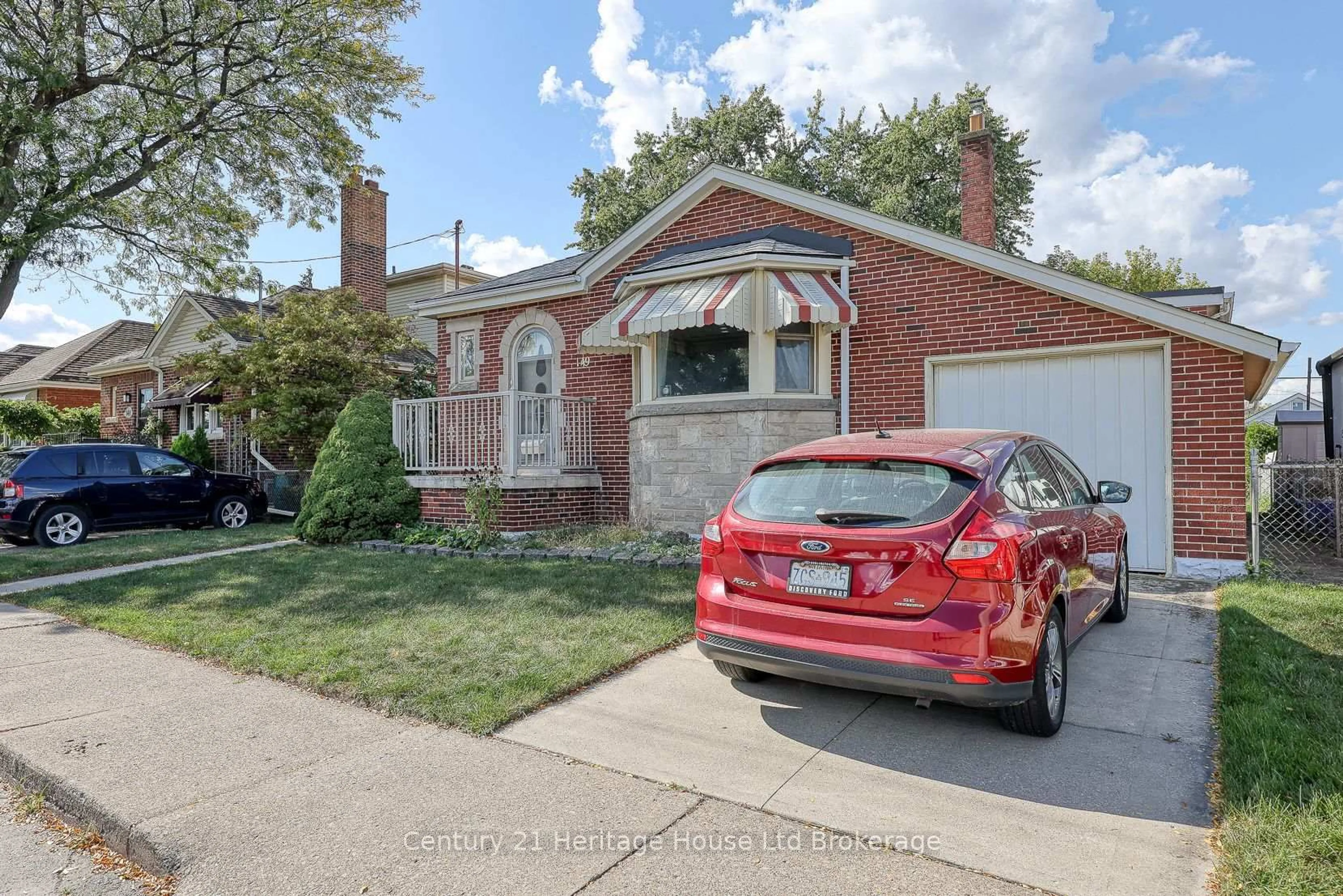 Home with brick exterior material, street for 149 Strathearne Ave, Hamilton Ontario L8H 5K7