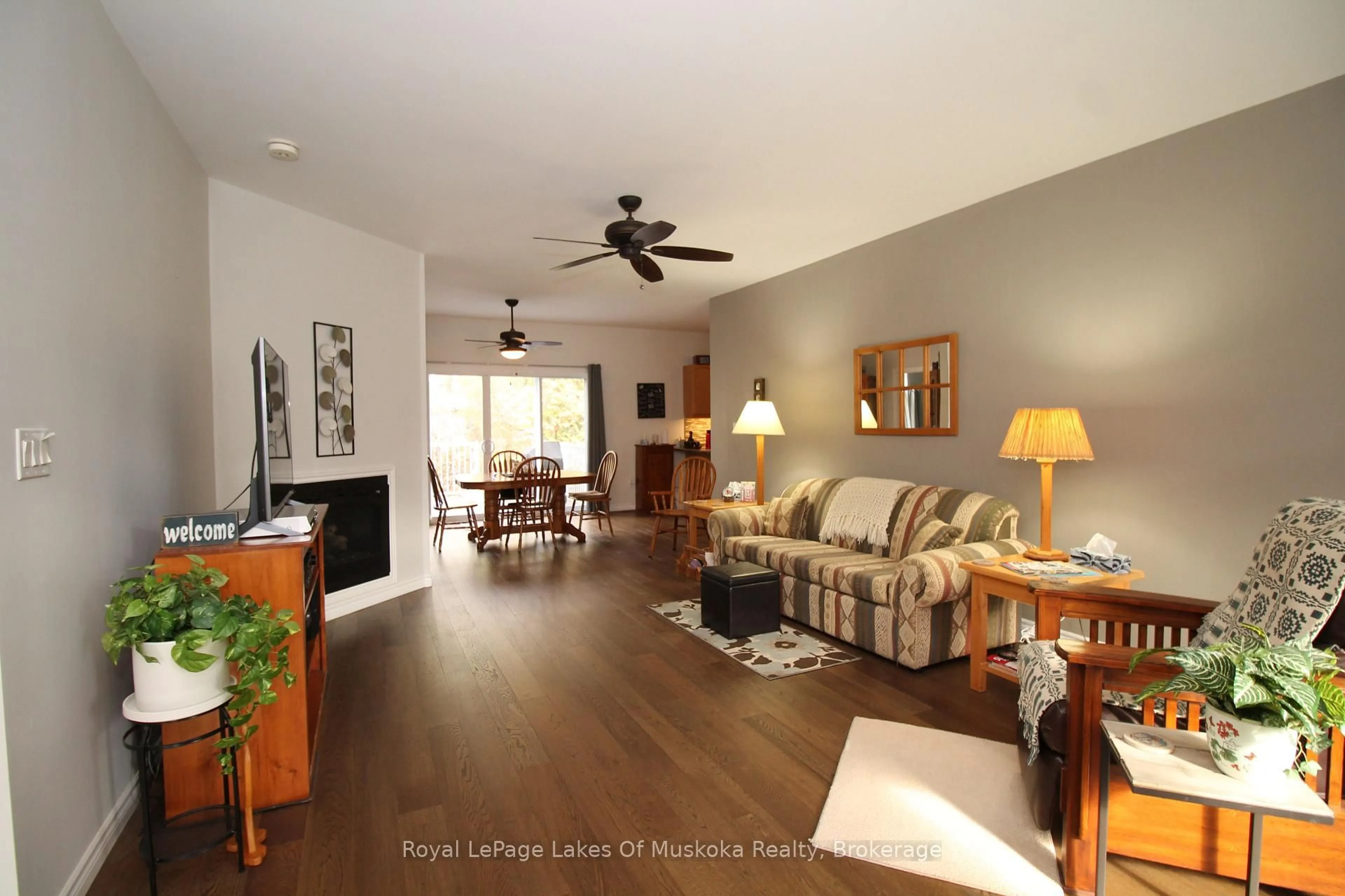 Living room with furniture, wood/laminate floor for 142 Pineridge Gate, Gravenhurst Ontario P1P 1Z1