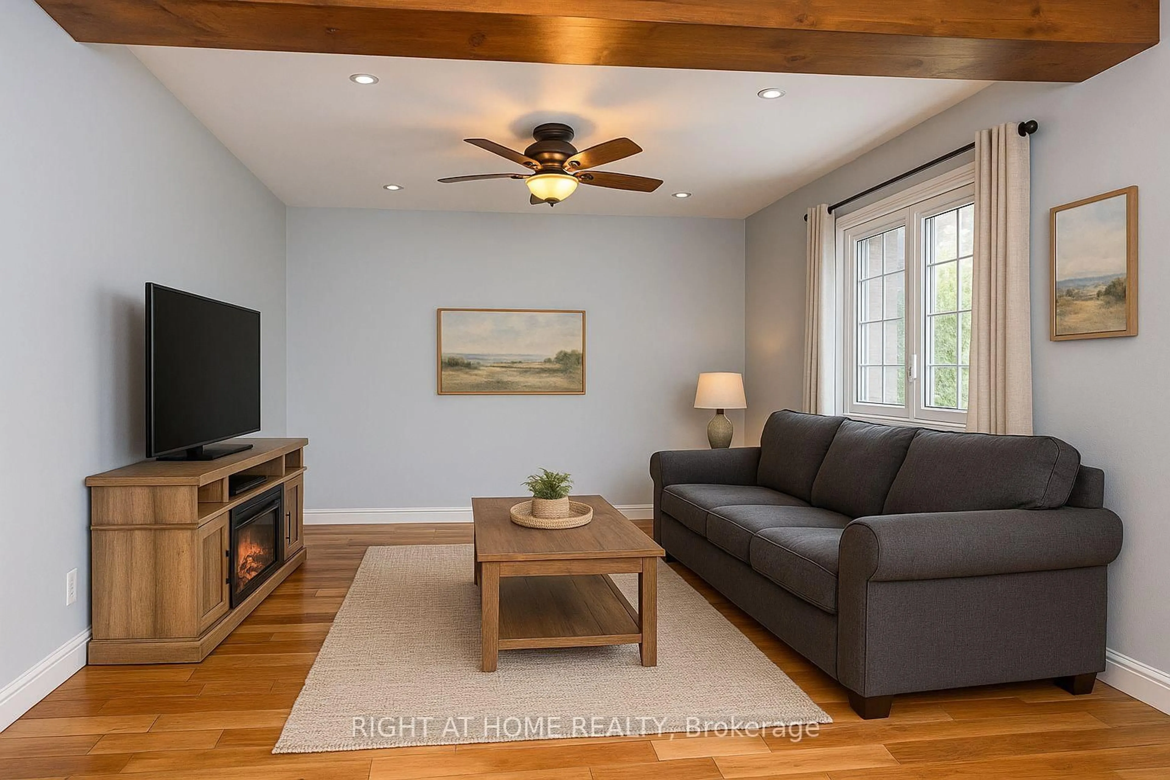 Living room with furniture, wood/laminate floor for 180 Rosslyn Ave, Hamilton Ontario L8L 7P7