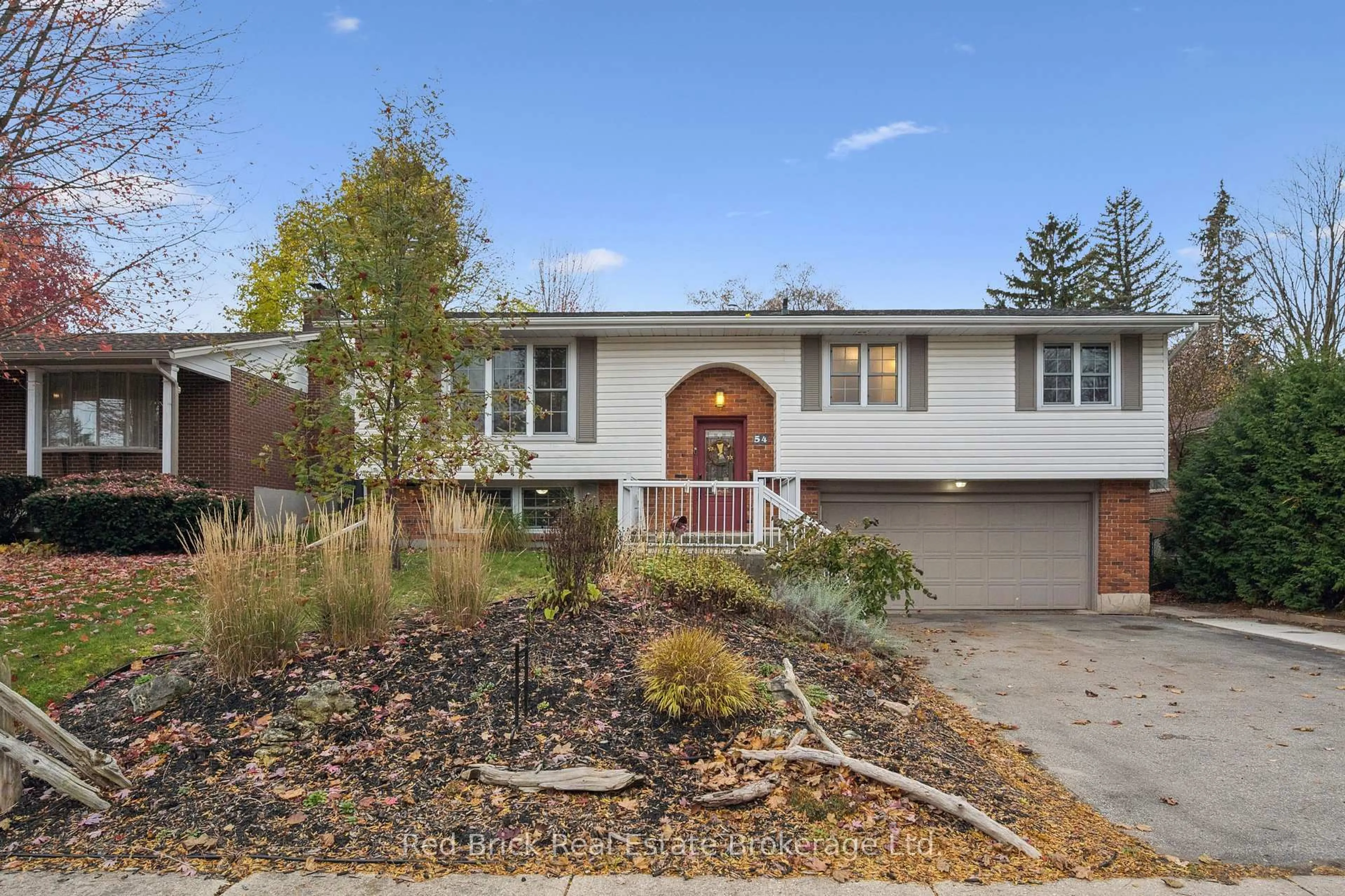 Home with brick exterior material, street for 54 Sherwood Dr, Guelph Ontario N1E 1R6