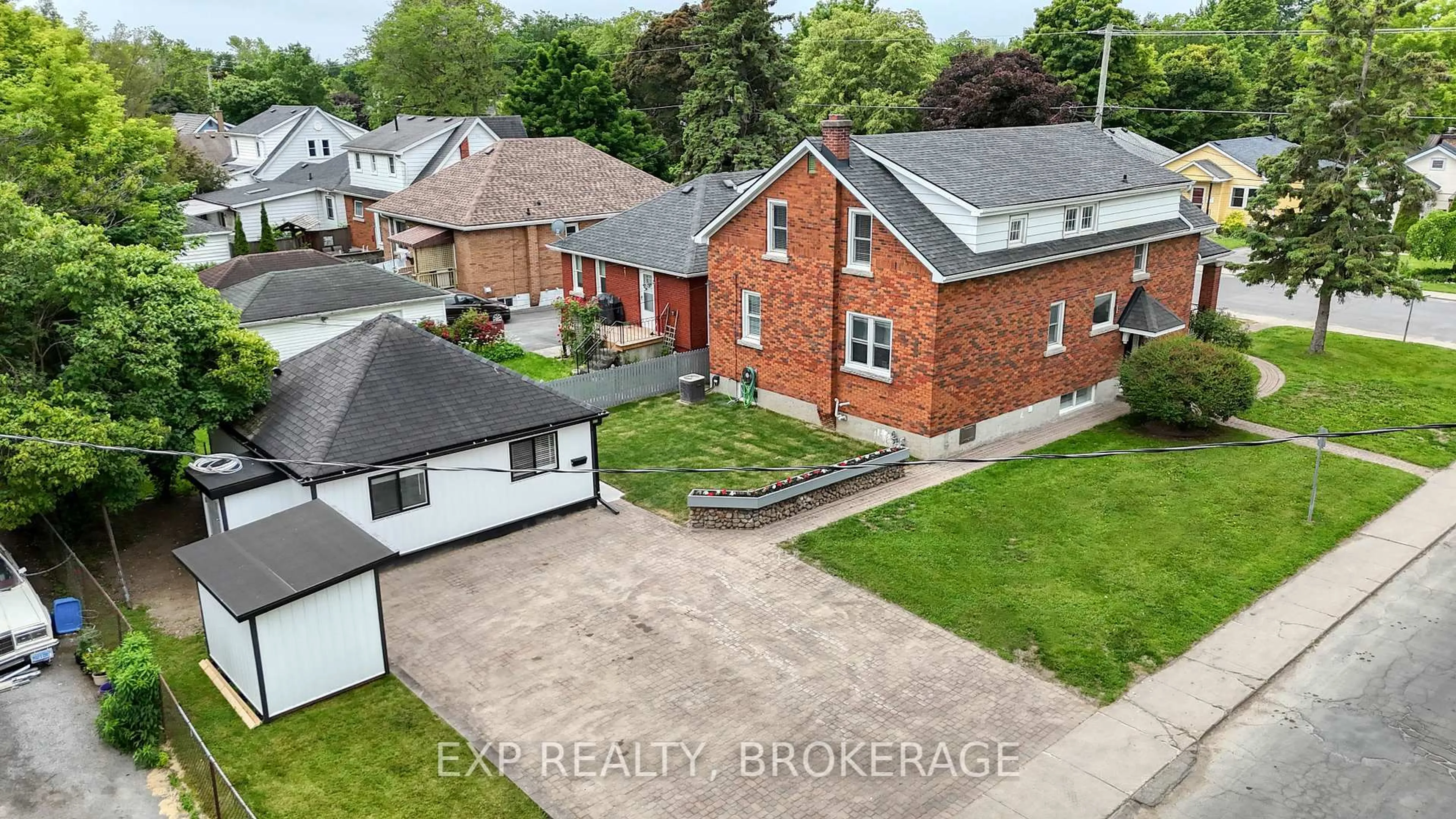 A pic from outside/outdoor area/front of a property/back of a property/a pic from drone, street for 493 COLLEGE St, Kingston Ontario K7L 4M8