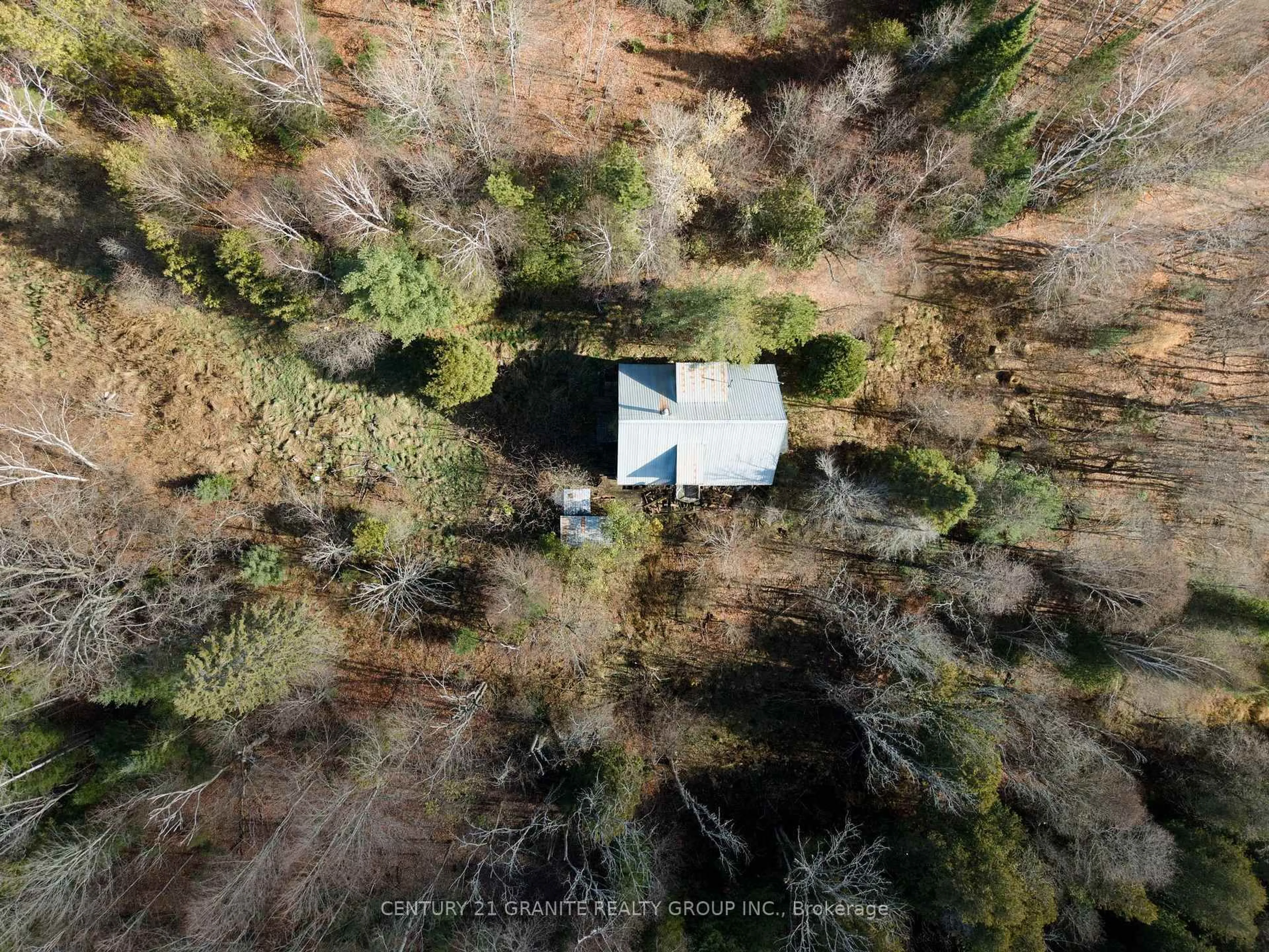 A pic from outside/outdoor area/front of a property/back of a property/a pic from drone, forest/trees view for 790 McDonald Mine Rd, Bancroft Ontario K0L 1C0