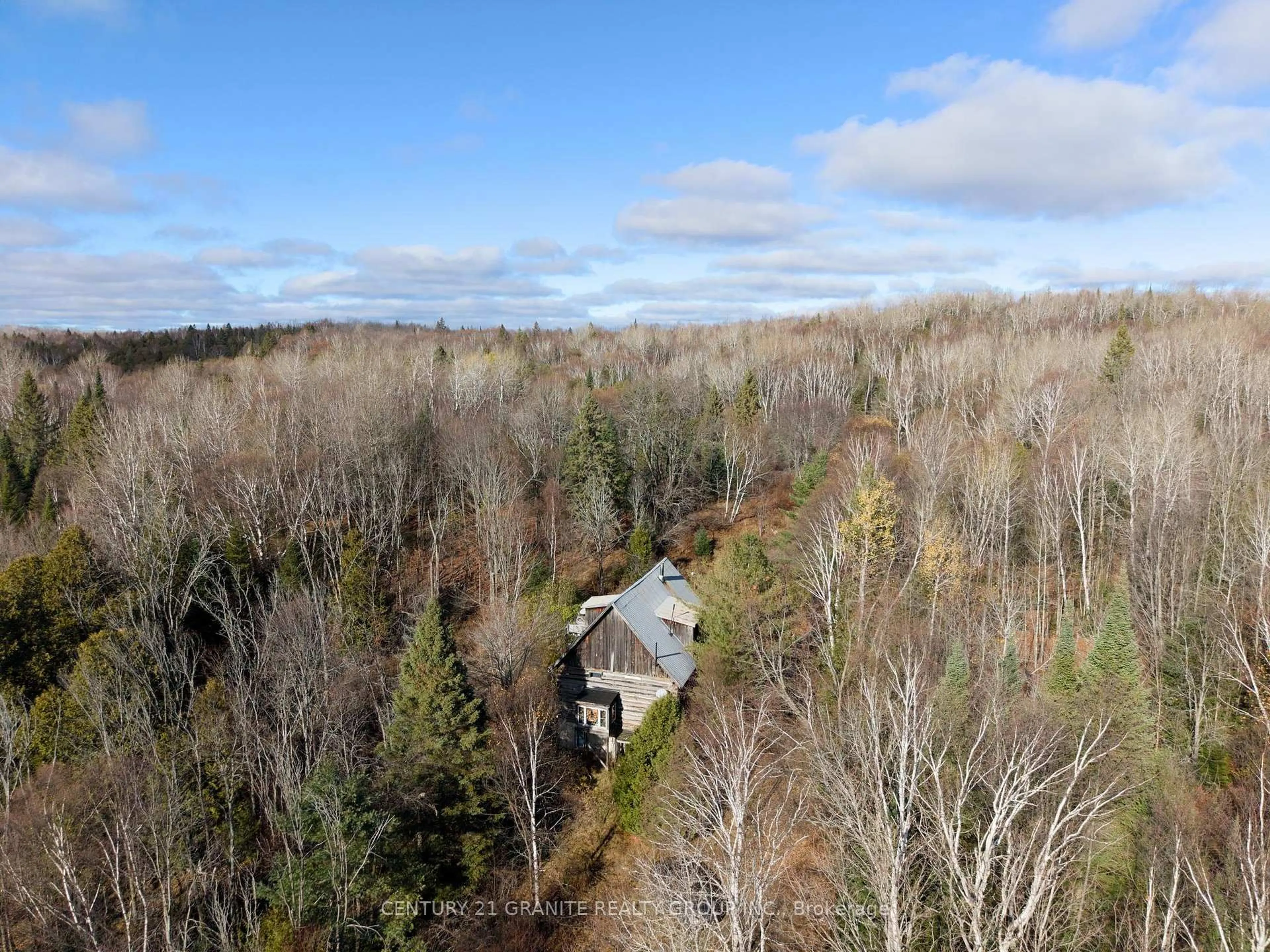 A pic from outside/outdoor area/front of a property/back of a property/a pic from drone, forest/trees view for 790 McDonald Mine Rd, Bancroft Ontario K0L 1C0