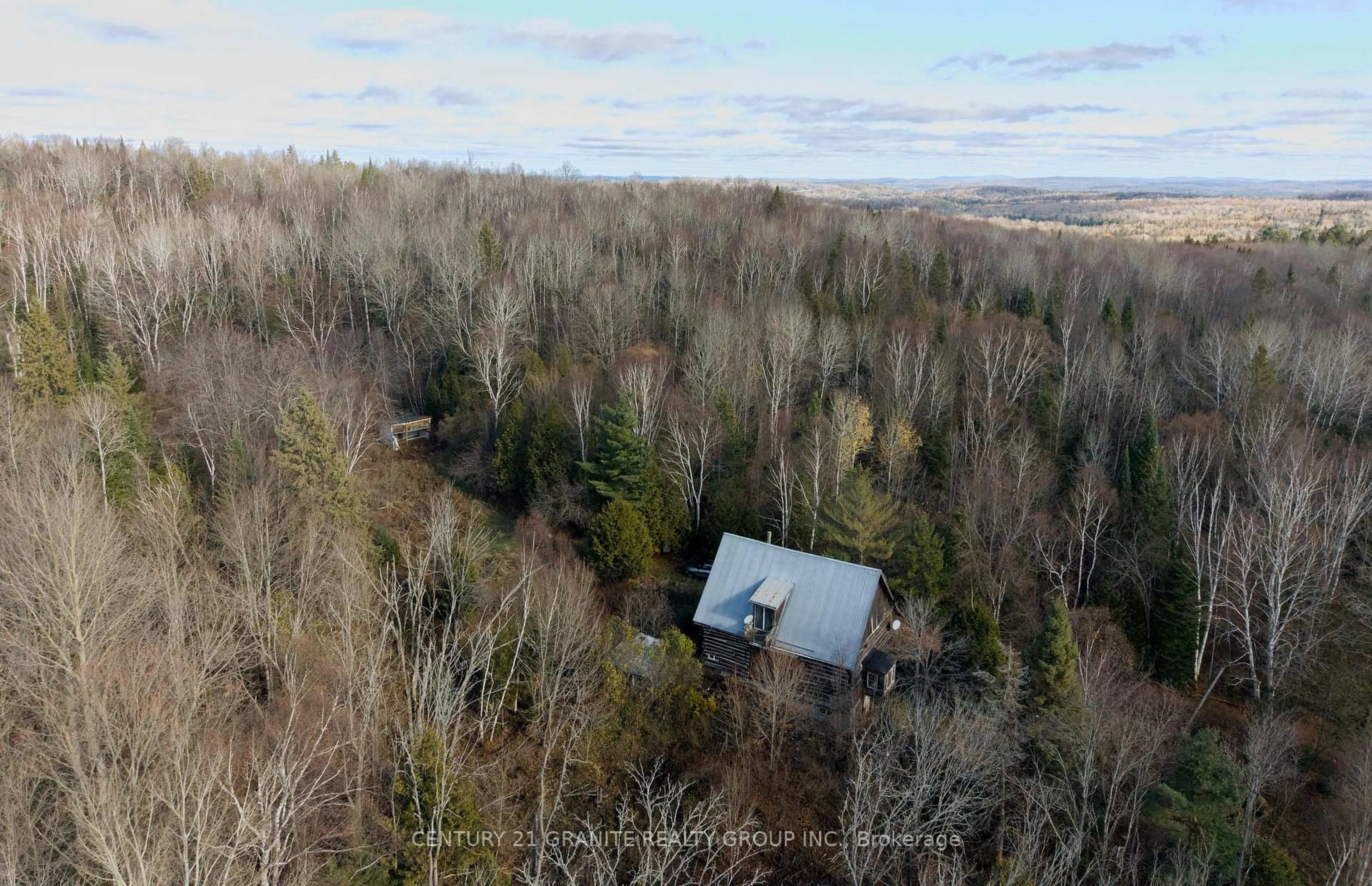 A pic from outside/outdoor area/front of a property/back of a property/a pic from drone, forest/trees view for 790 McDonald Mine Rd, Bancroft Ontario K0L 1C0