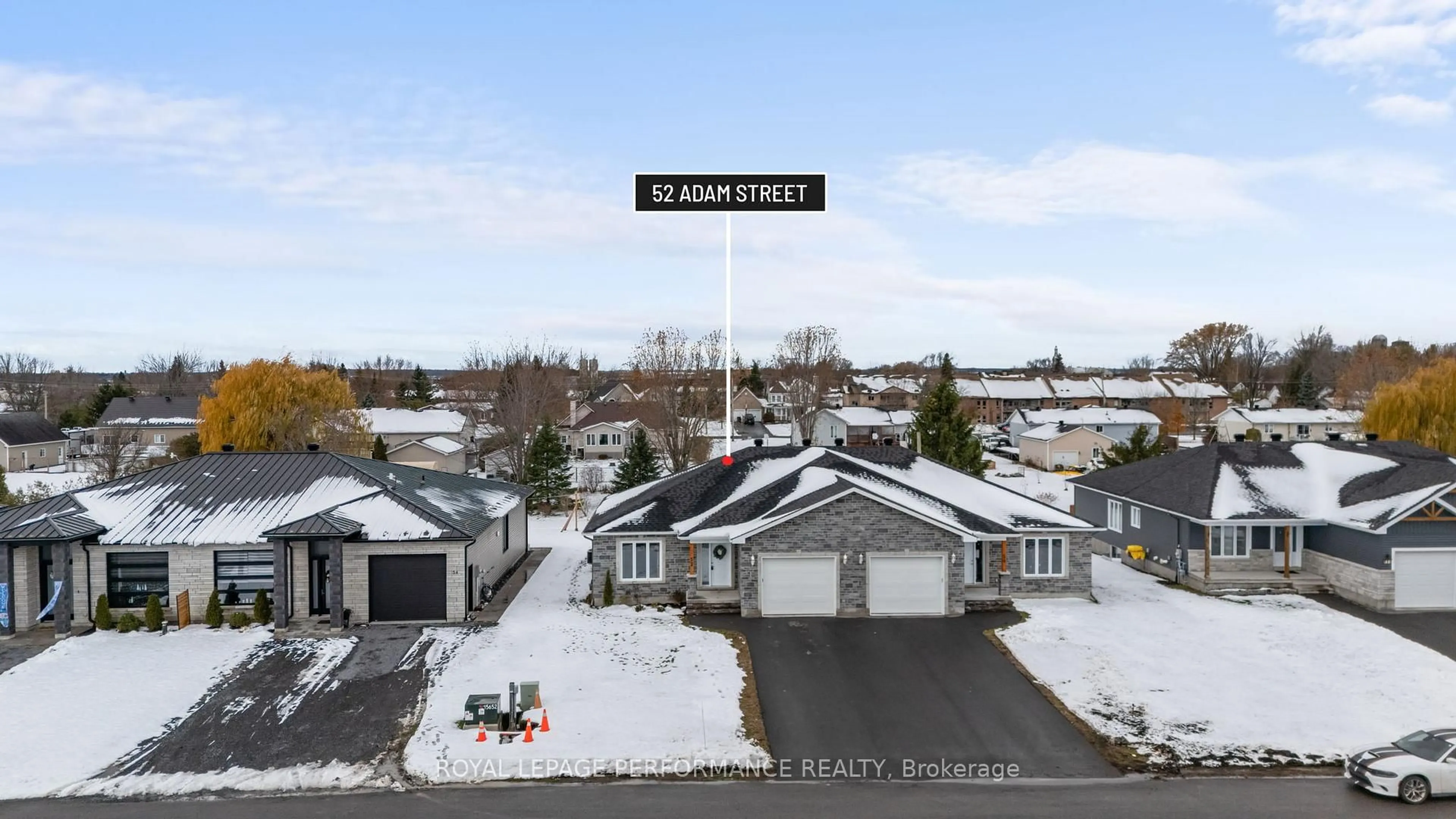 A pic from outside/outdoor area/front of a property/back of a property/a pic from drone, street for 52 Adam St, The Nation Ontario K0A 3C0