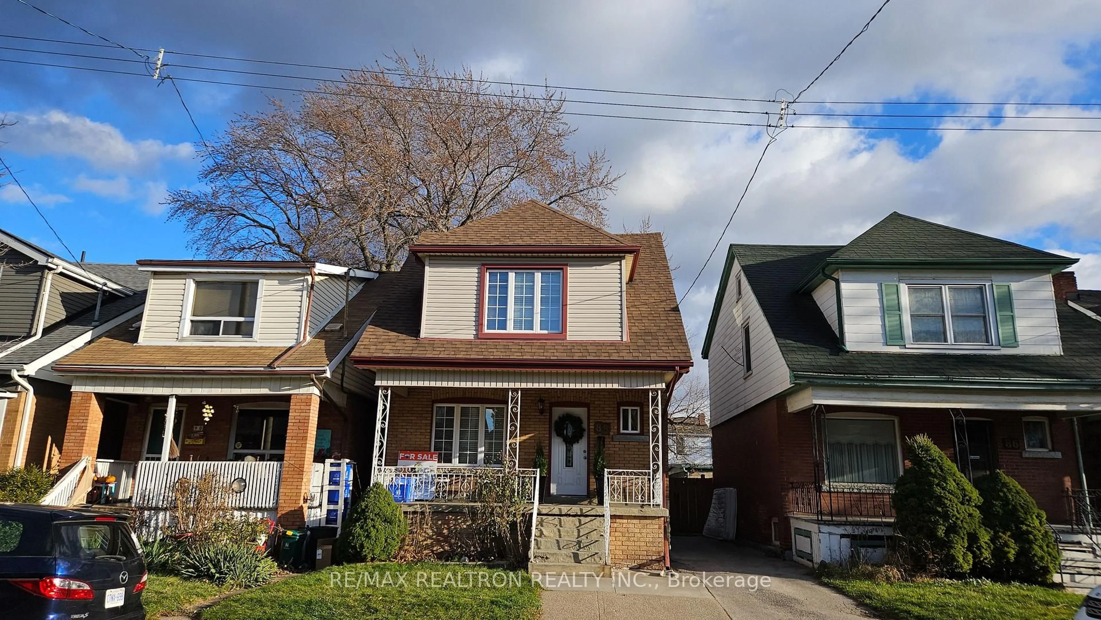 Home with brick exterior material, street for 88 Kensington Ave, Hamilton Ontario L8L 7N2