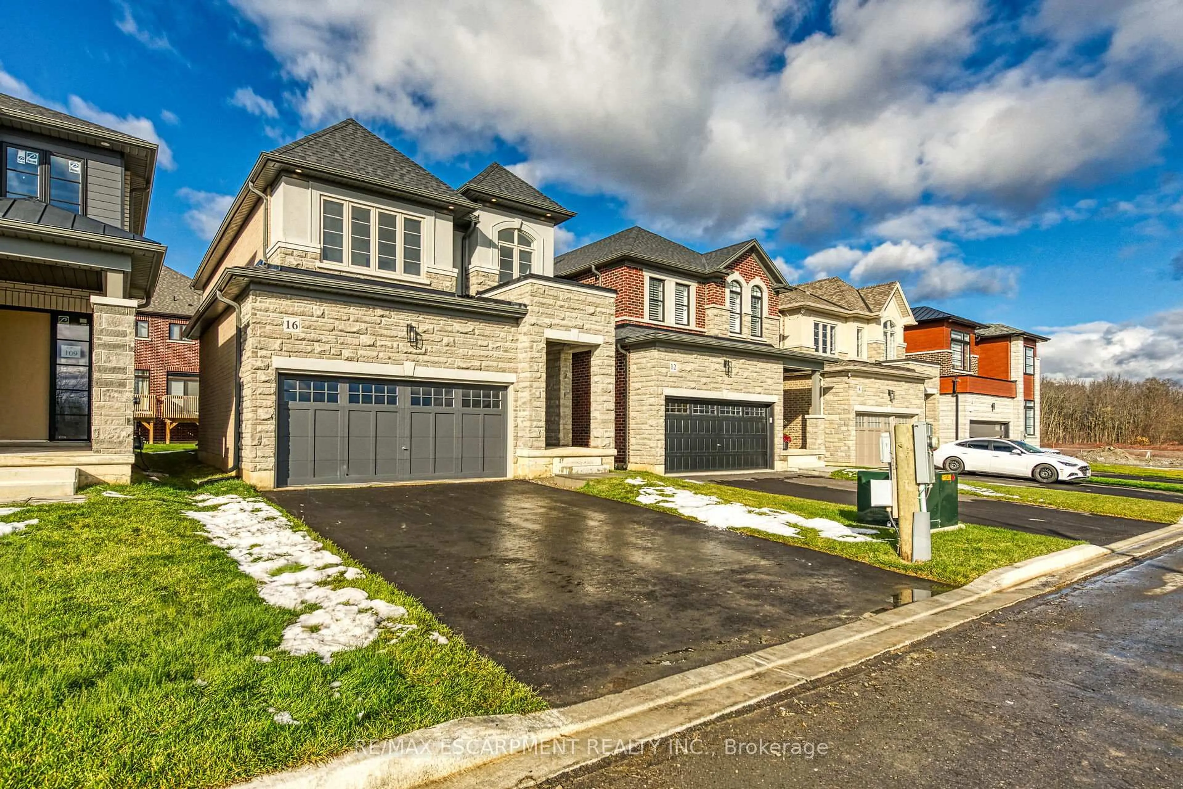 Home with brick exterior material, street for 16 Sagewood Dr, Hamilton Ontario L9B 0K7