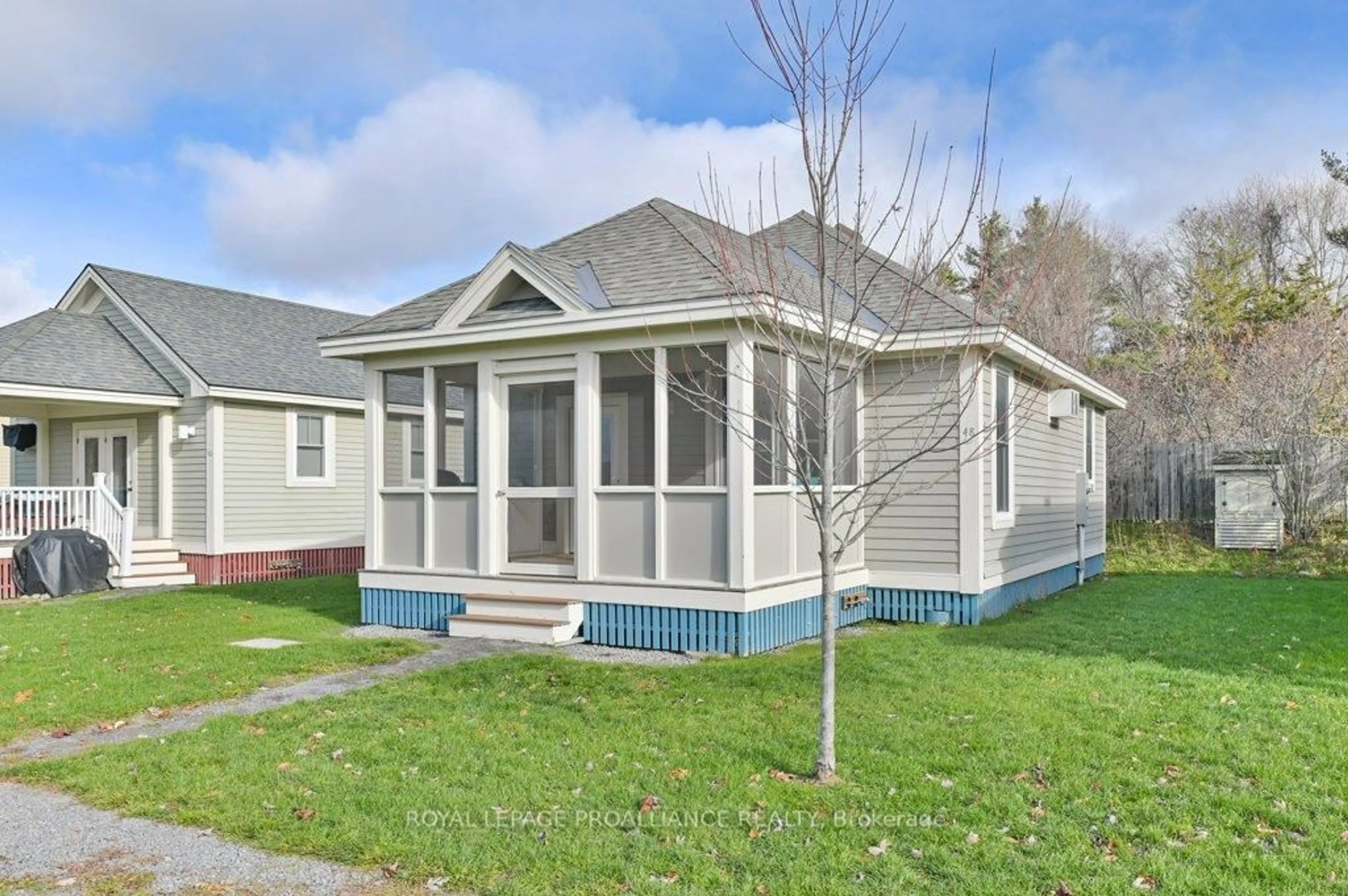 Home with vinyl exterior material, street for 48 Meadow View Lane, Prince Edward County Ontario K0K 1P0