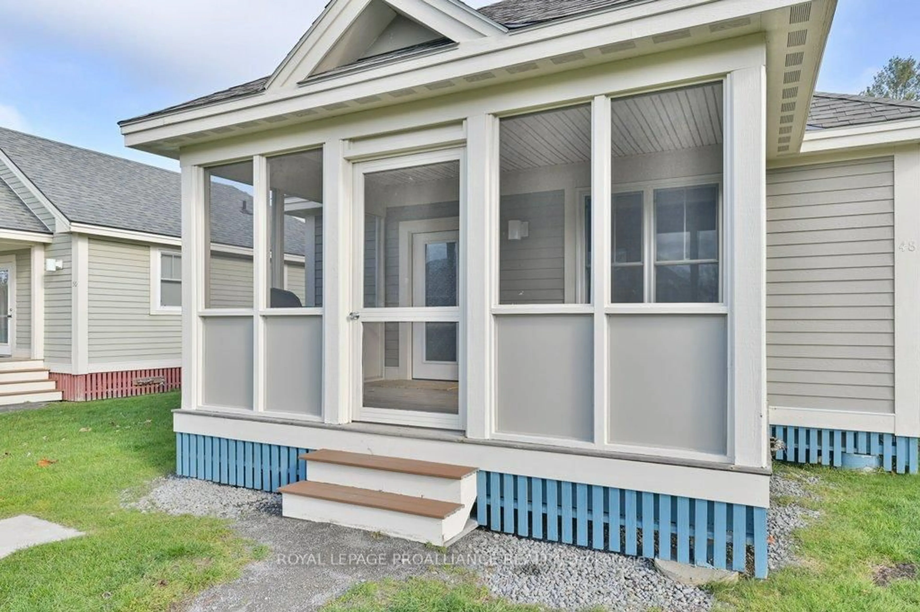 Home with vinyl exterior material, street for 48 Meadow View Lane, Prince Edward County Ontario K0K 1P0