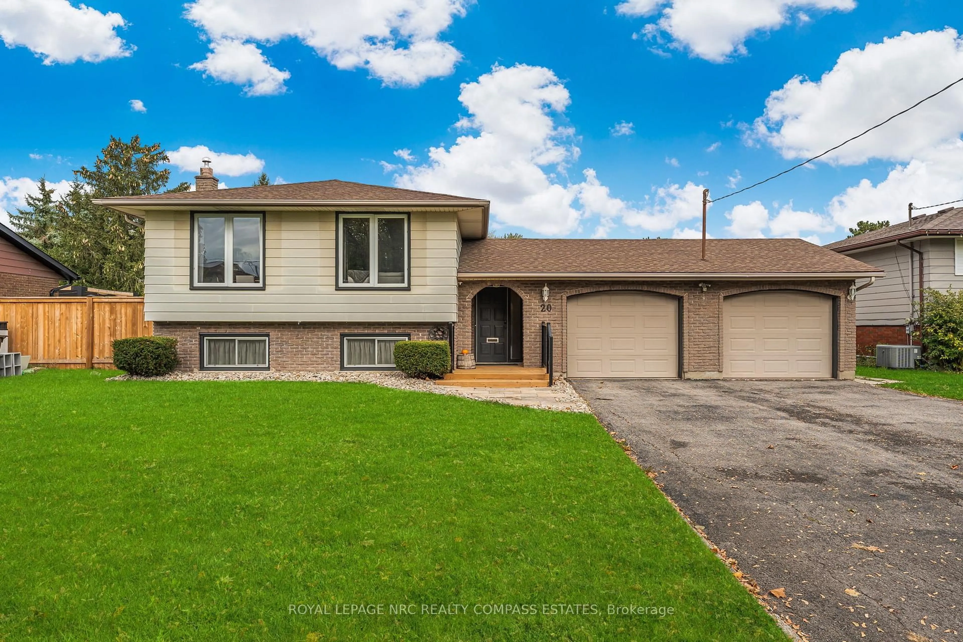 Home with vinyl exterior material, street for 20 Prince Philip Dr, St. Catharines Ontario L2N 3H8