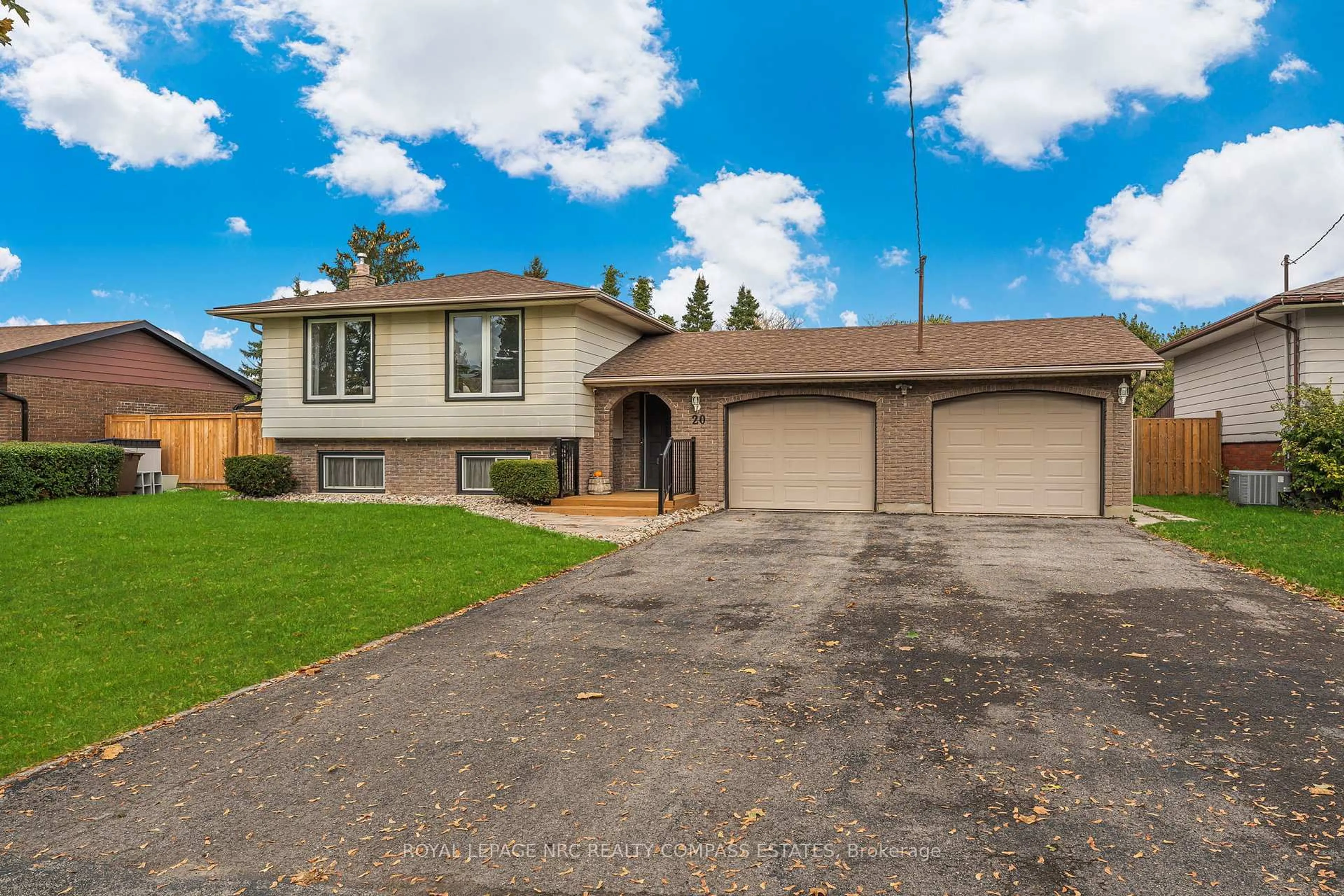 Home with vinyl exterior material, street for 20 Prince Philip Dr, St. Catharines Ontario L2N 3H8