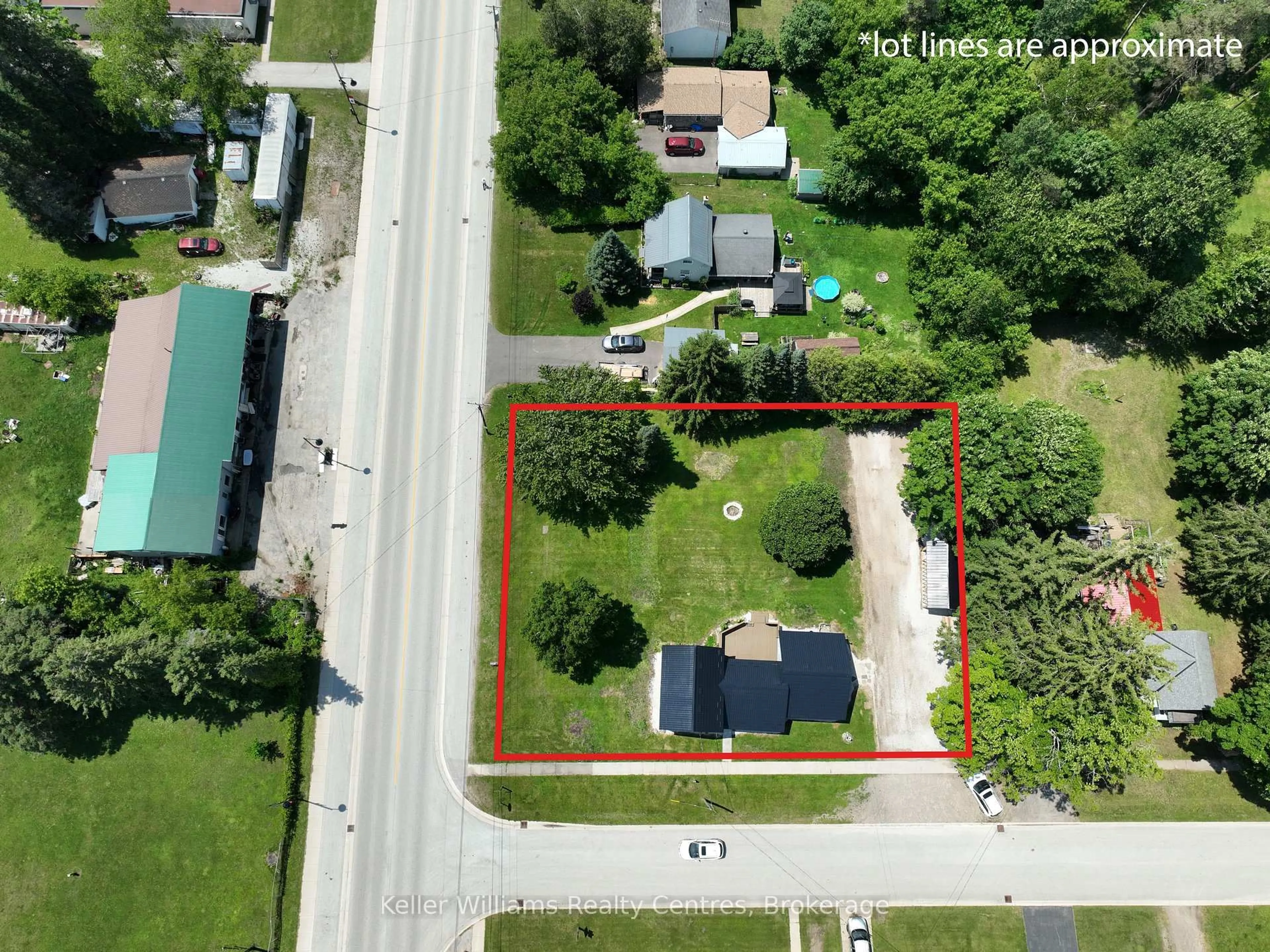 A pic from outside/outdoor area/front of a property/back of a property/a pic from drone, street for 52 Queen St, South Bruce Peninsula Ontario N0H 1P0
