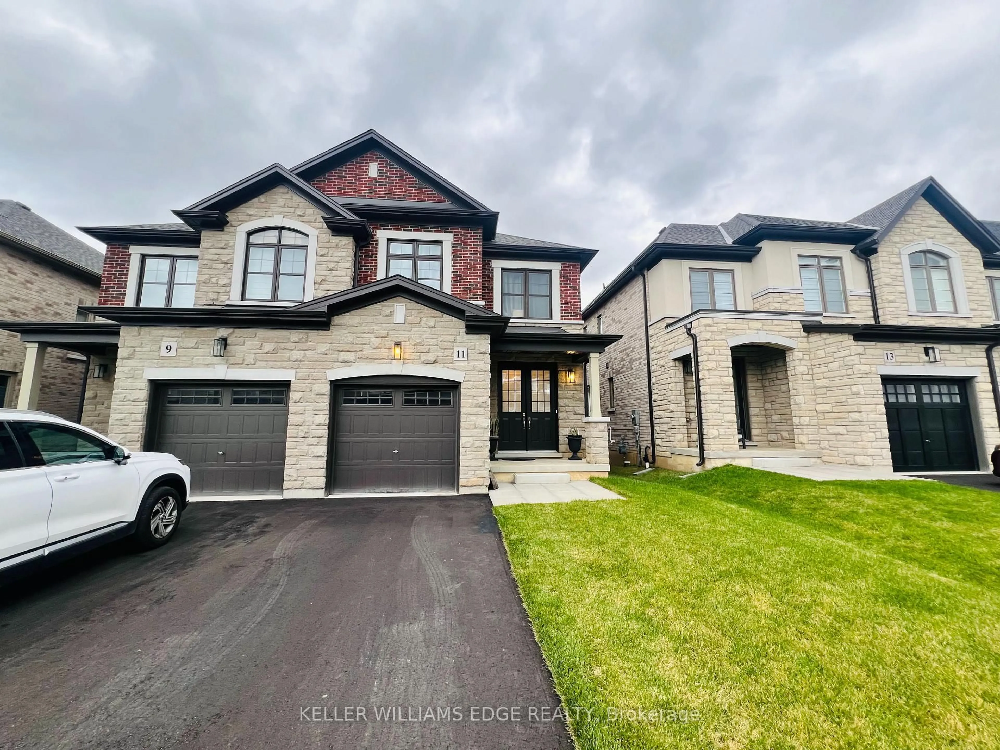 Home with brick exterior material, street for 11 Cherry Blossom Hts, Hamilton Ontario L9B 0E9