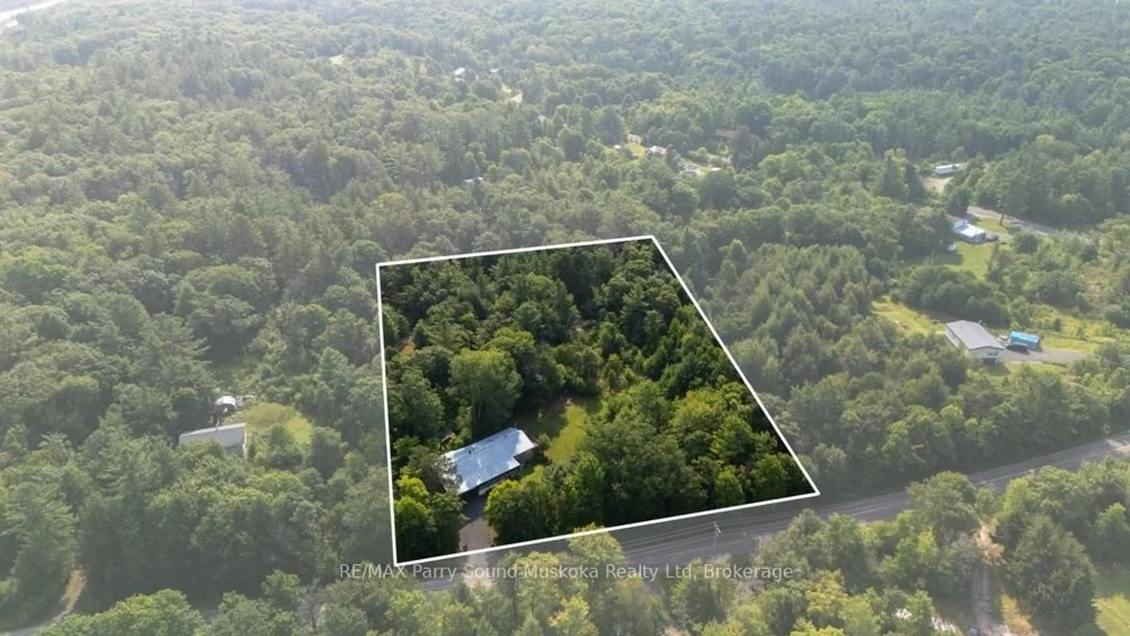 A pic from outside/outdoor area/front of a property/back of a property/a pic from drone, forest/trees view for 28 Black Rd, Seguin Ontario P2A 2W8