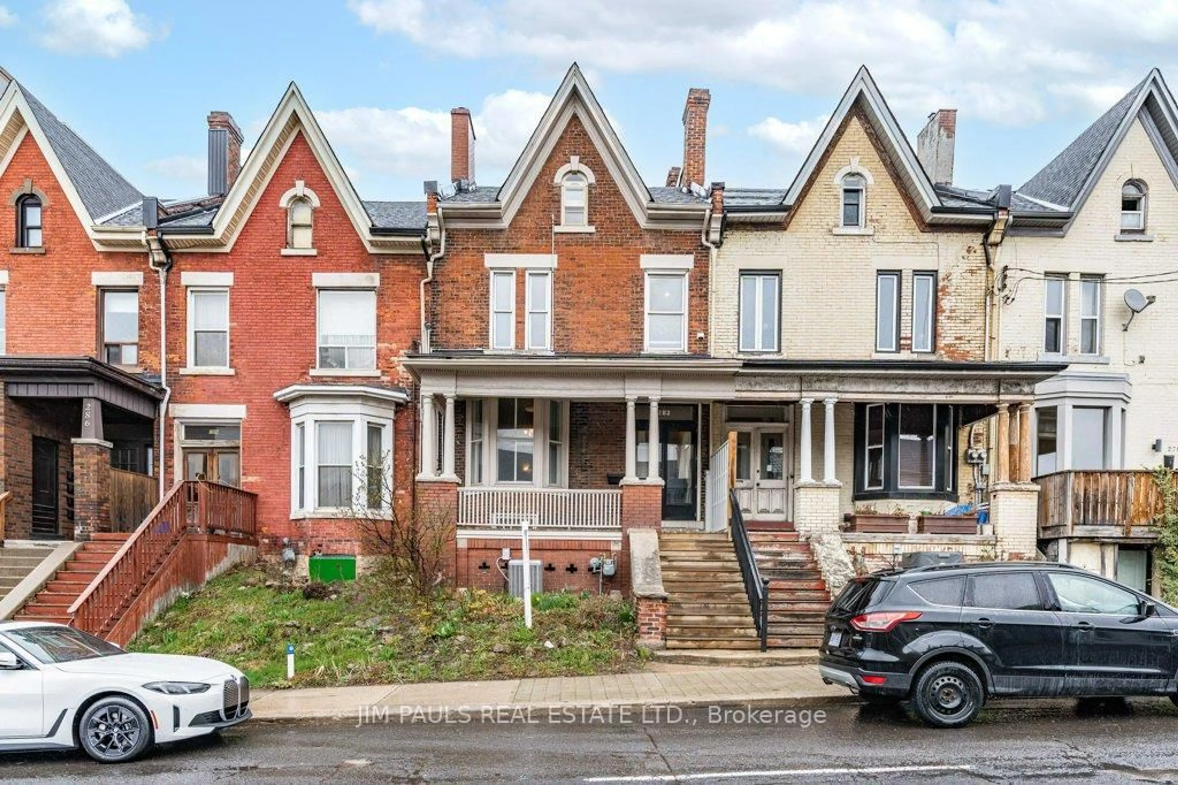 Home with brick exterior material, street for 282 Main St, Hamilton Ontario L8P 1J8