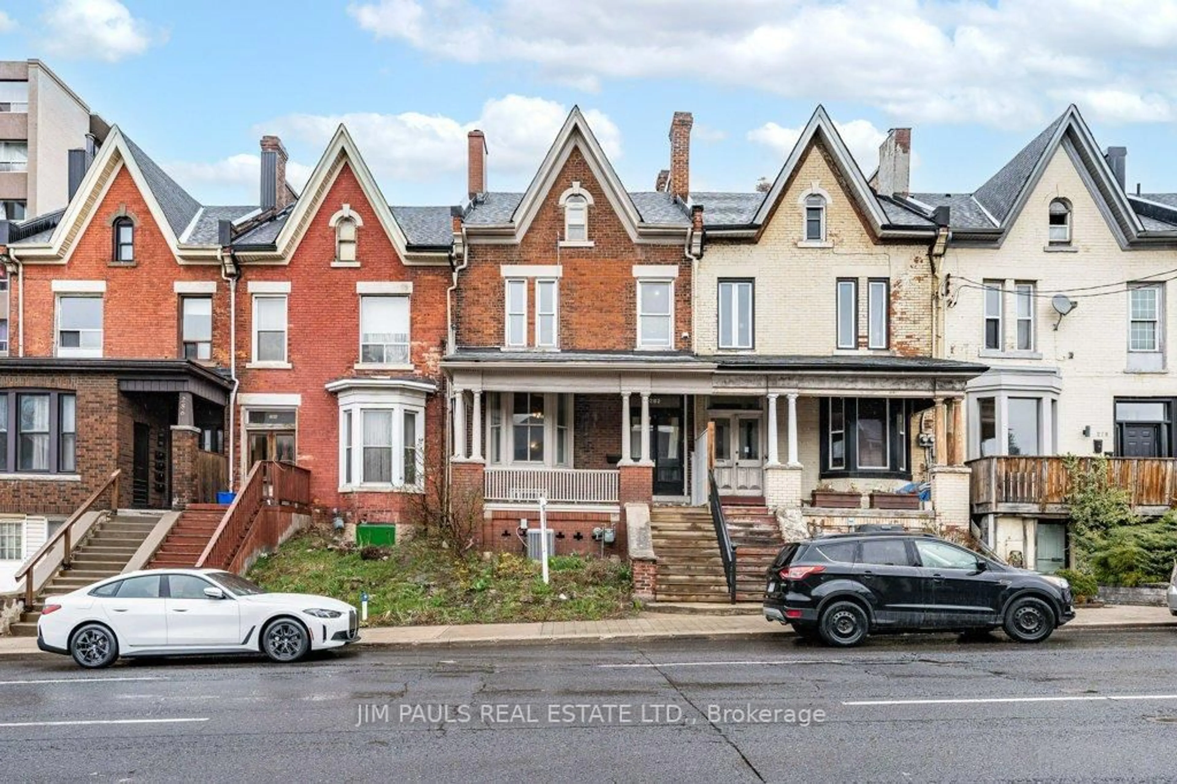 Home with brick exterior material, street for 282 Main St, Hamilton Ontario L8P 1J8