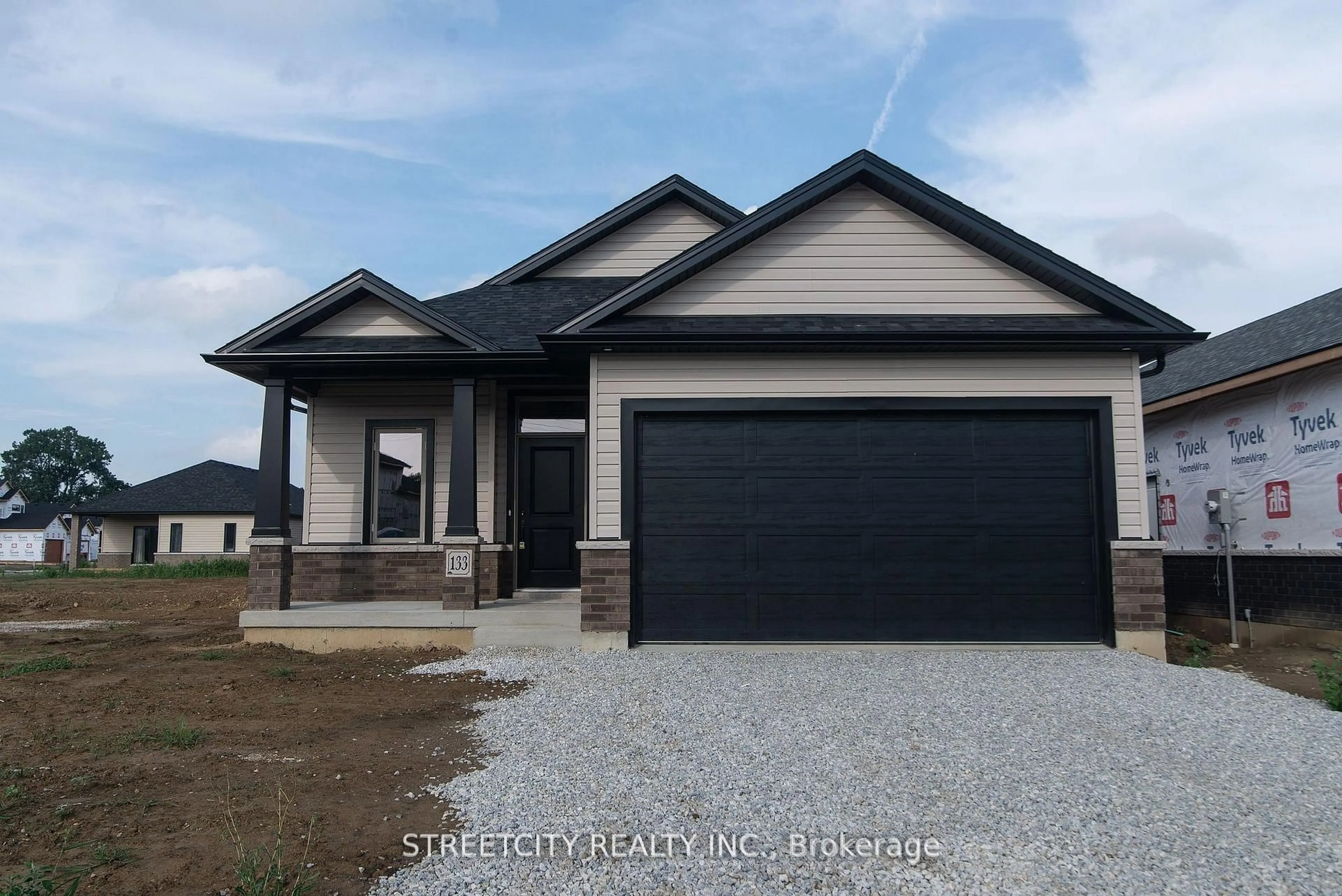 Home with vinyl exterior material, street for 133 CABOT Tr, Chatham-Kent Ontario N7L 0G5
