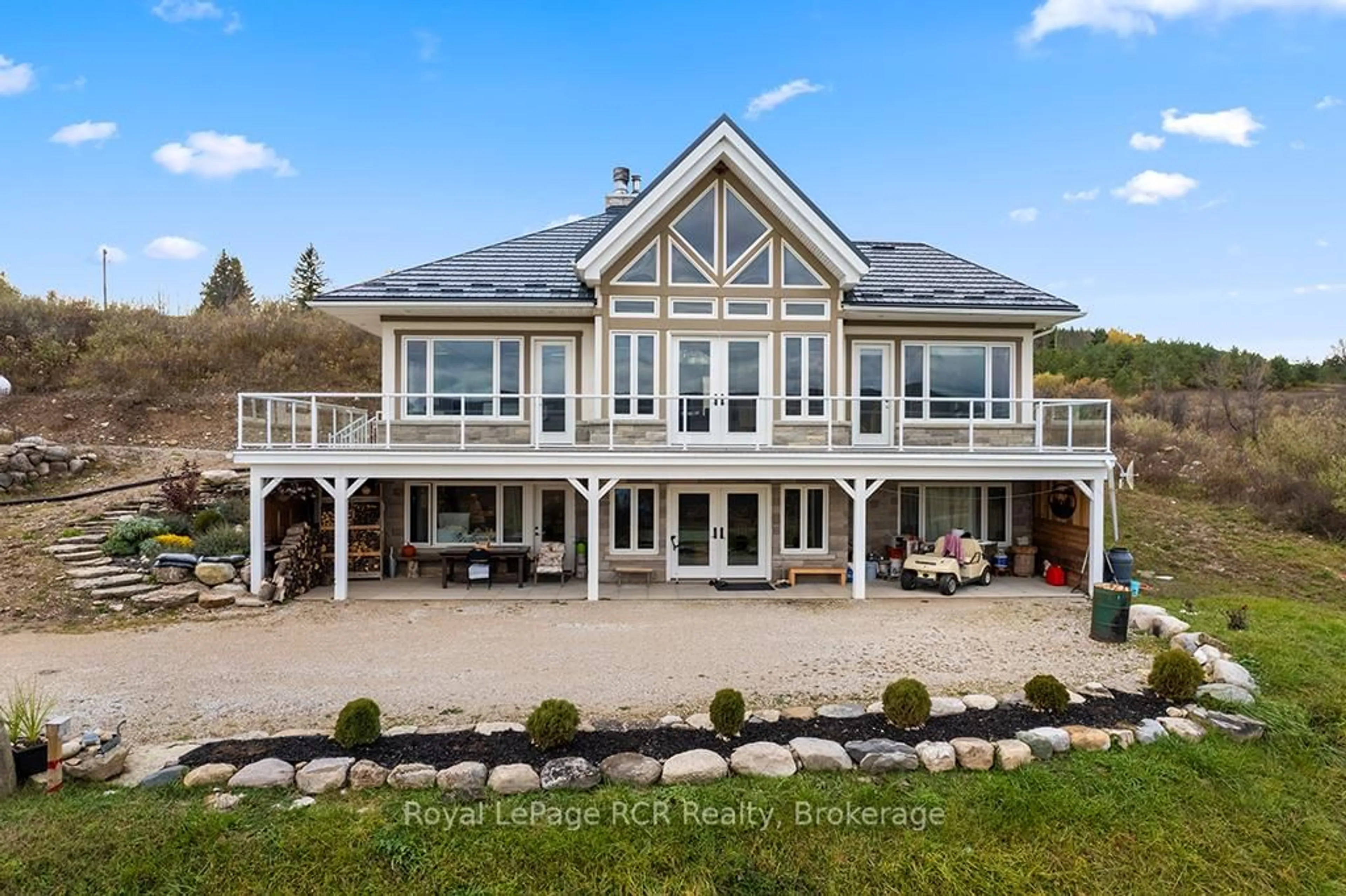 A pic from outside/outdoor area/front of a property/back of a property/a pic from drone, water/lake/river/ocean view for 195781 Grey 7 Rd, Grey Highlands Ontario N0C 1H0