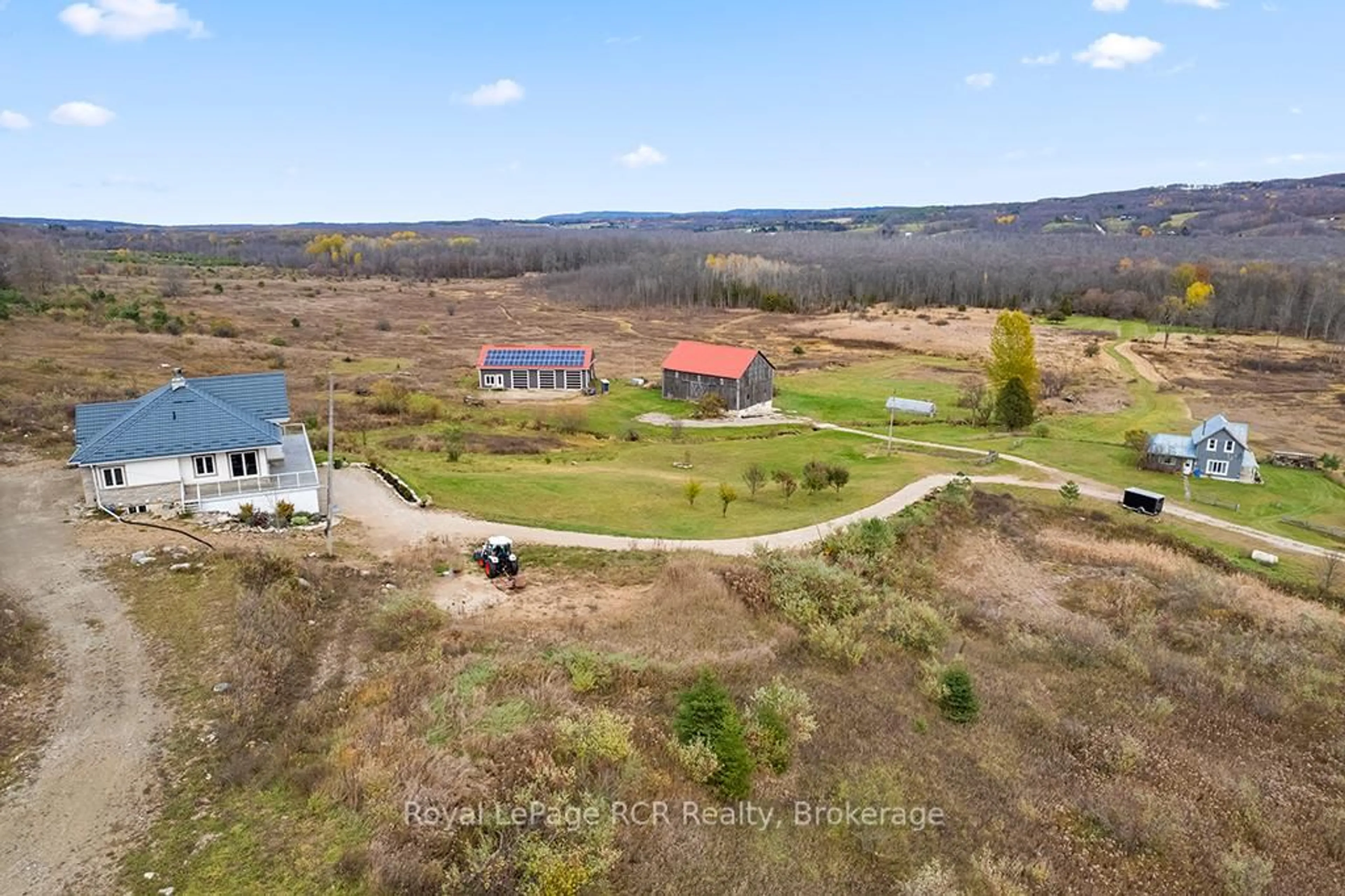A pic from outside/outdoor area/front of a property/back of a property/a pic from drone, unknown for 195781 Grey 7 Rd, Grey Highlands Ontario N0C 1H0