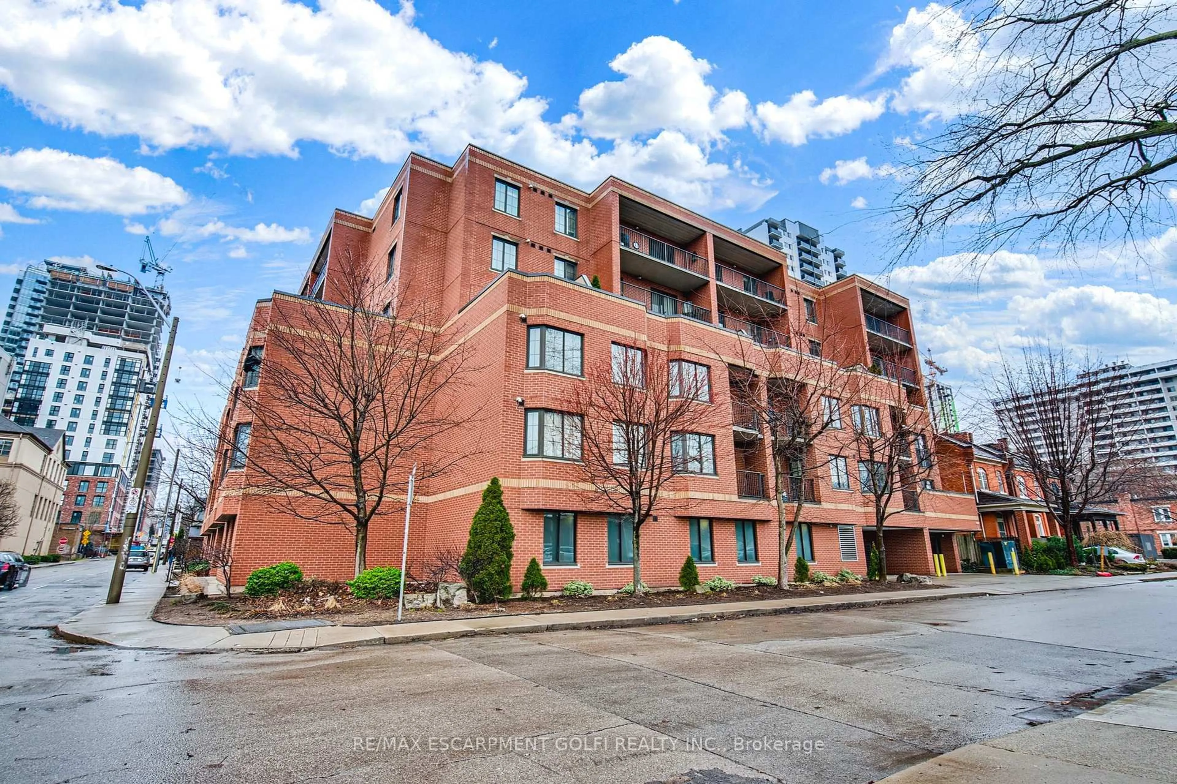 Home with brick exterior material, street for 47 Caroline St #401, Hamilton Ontario L8R 2R6