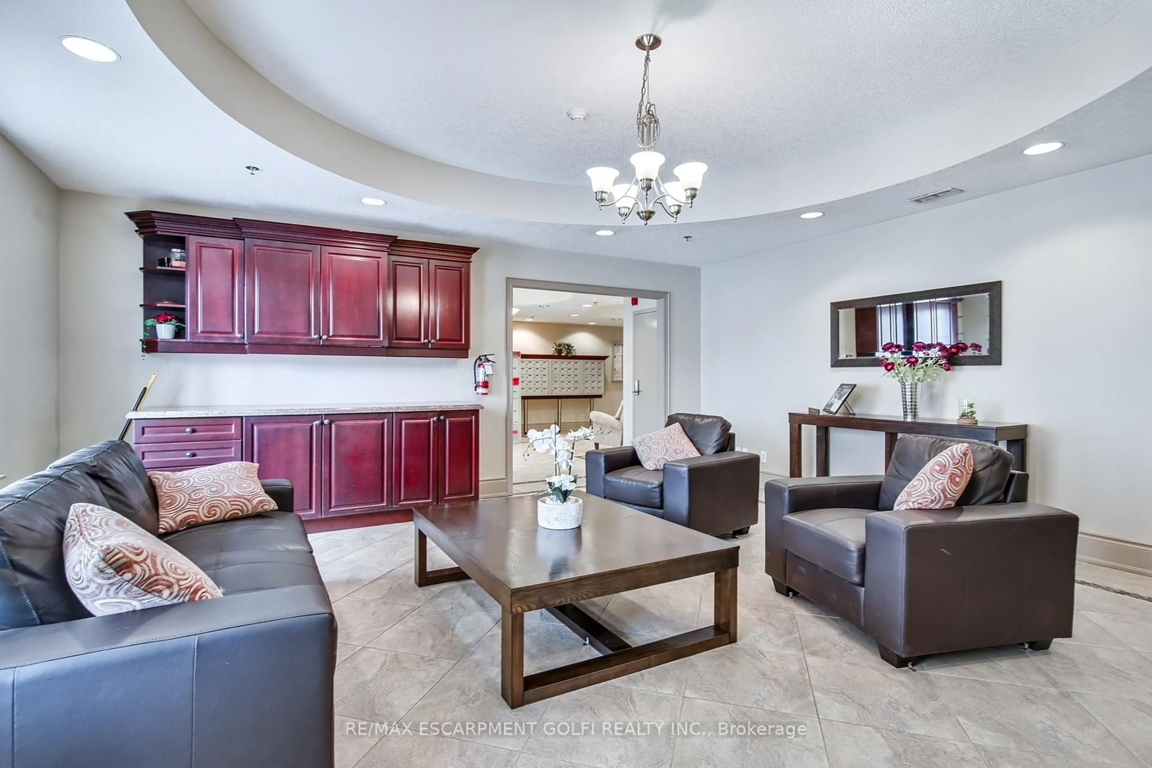 Living room with furniture, ceramic/tile floor for 47 Caroline St #401, Hamilton Ontario L8R 2R6