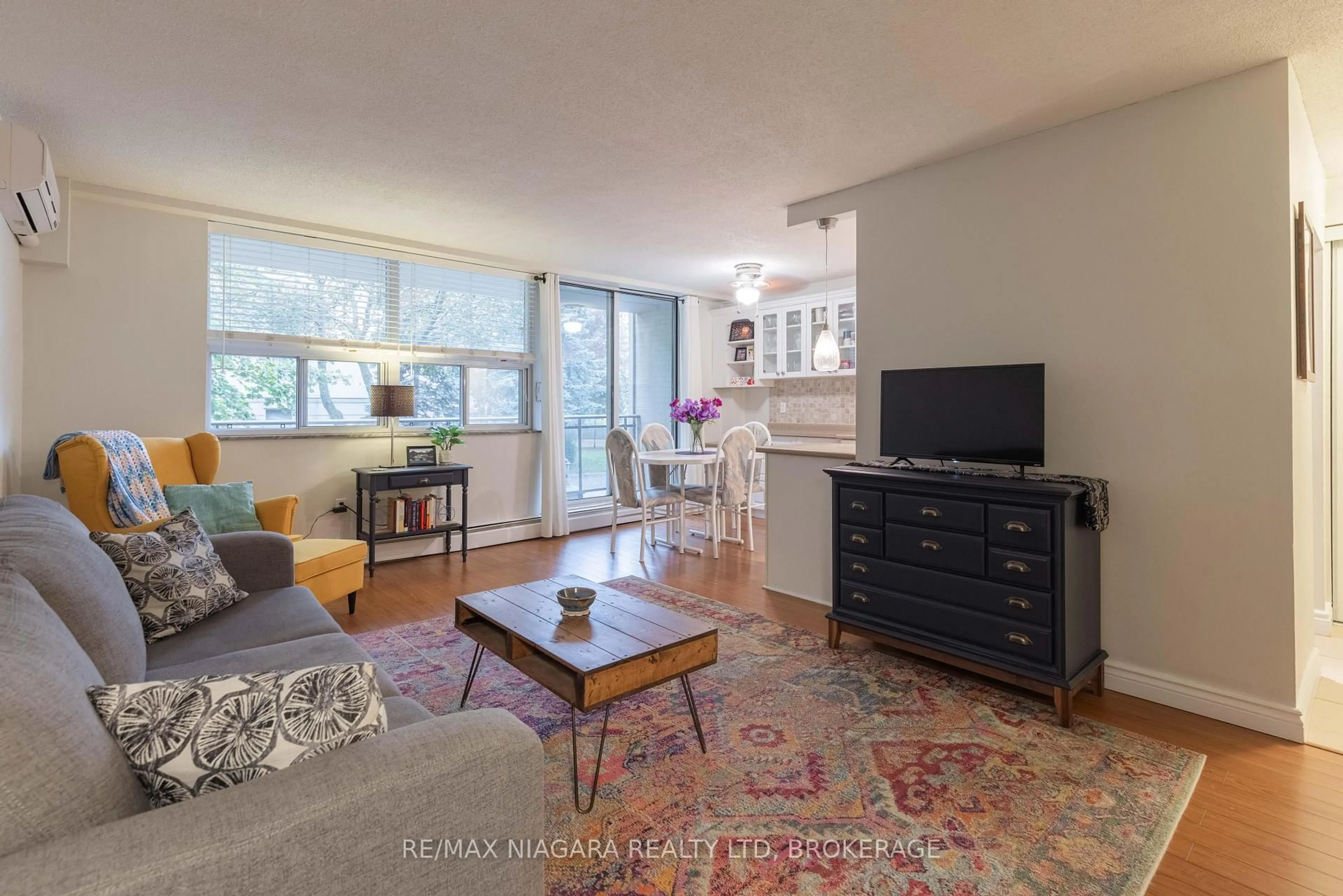 Living room with furniture, unknown for 6390 Huggins St #209, Niagara Falls Ontario L2J 1H1