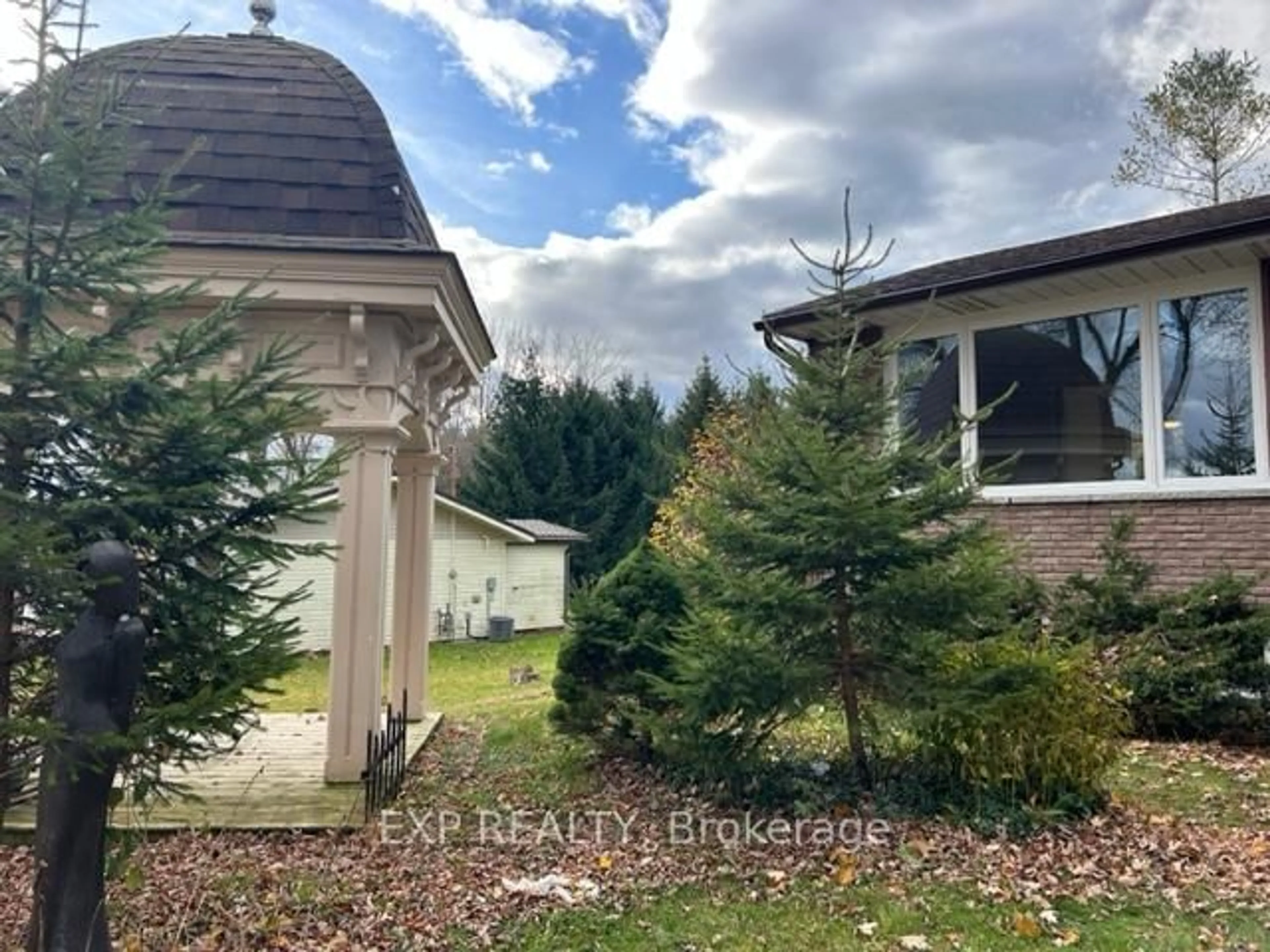A pic from outside/outdoor area/front of a property/back of a property/a pic from drone, forest/trees view for 7422 Road 164 Rd, North Perth Ontario N0G 1B0