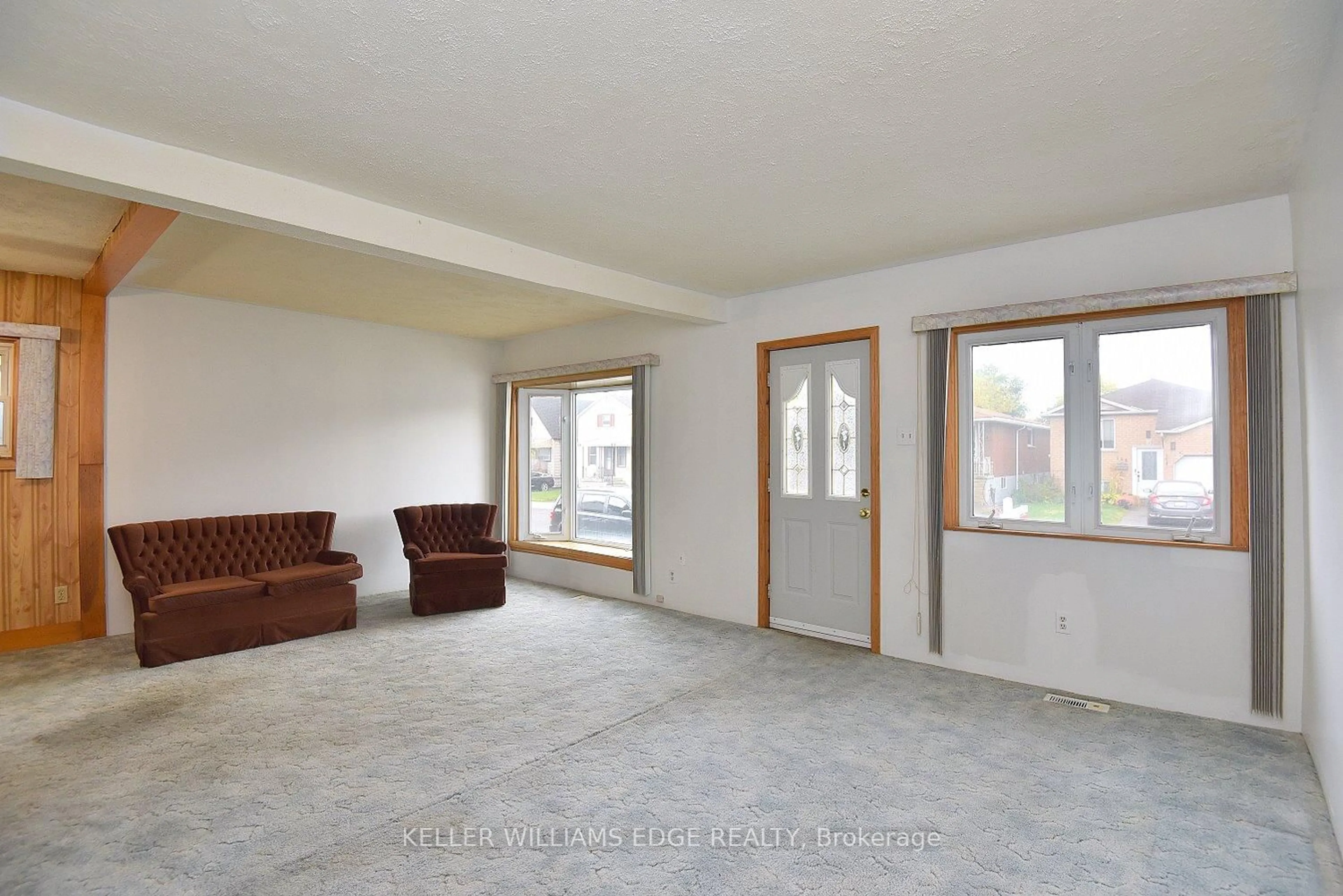 Living room with furniture, unknown for 149 Ivon Ave, Hamilton Ontario L8H 5S7