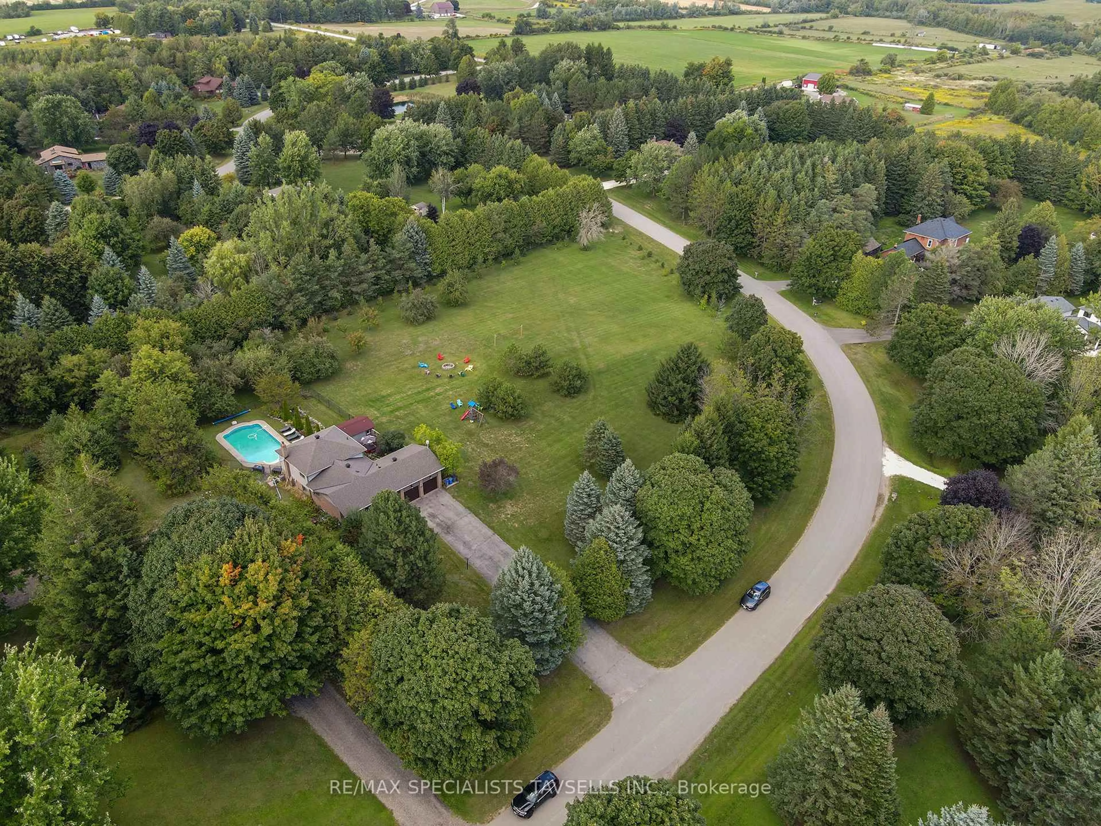 A pic from outside/outdoor area/front of a property/back of a property/a pic from drone, forest/trees view for 23 Mckibbon Ave, Amaranth Ontario L9W 5M2