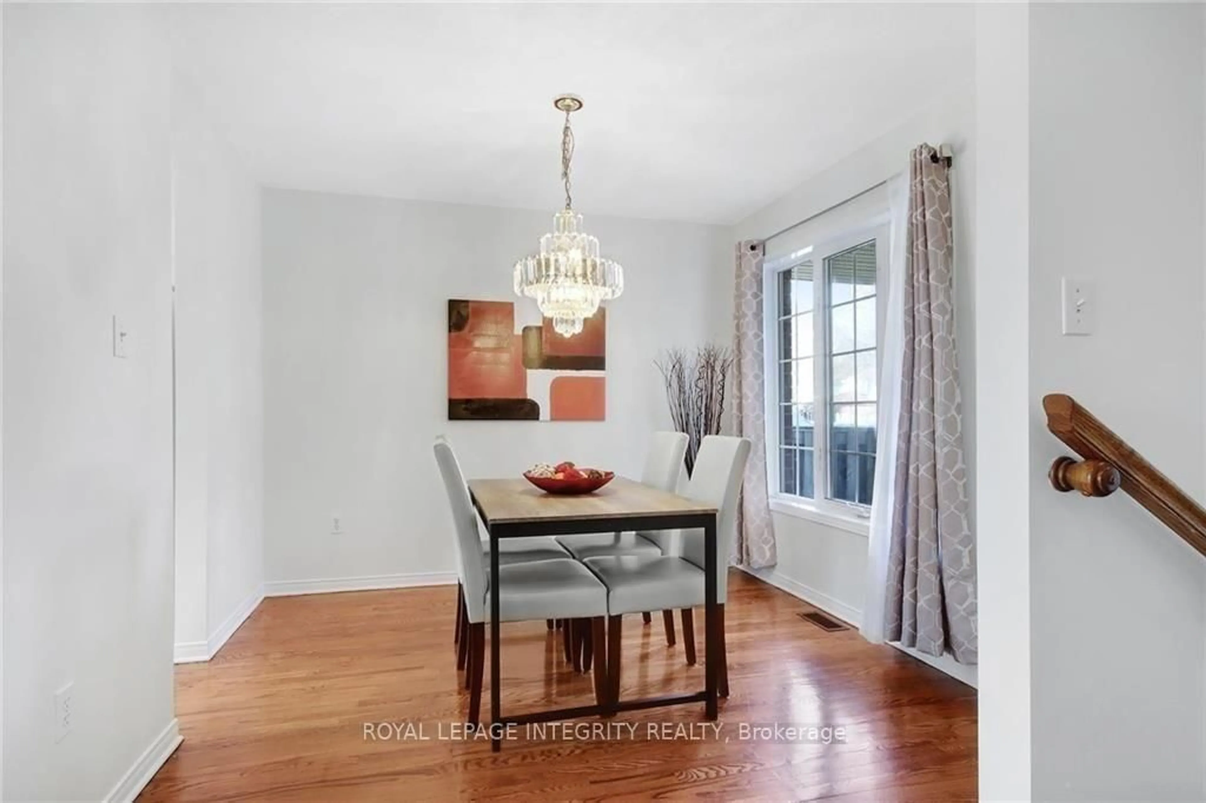 Dining room, wood/laminate floor for 77 Daventry Cres, Ottawa Ontario K2J 4M8