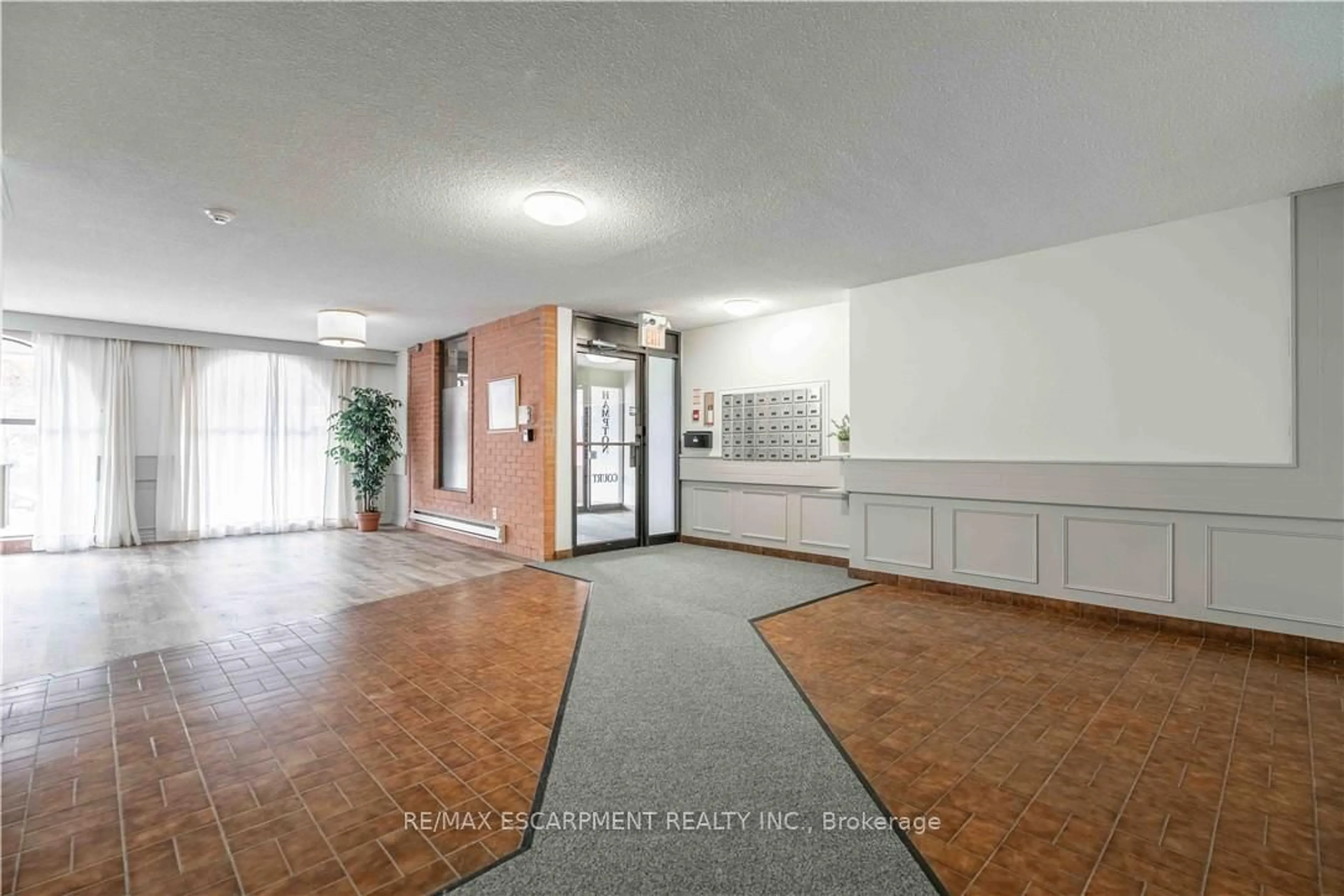 Indoor foyer for 23 Main St #502, Hamilton Ontario L9H 2P7