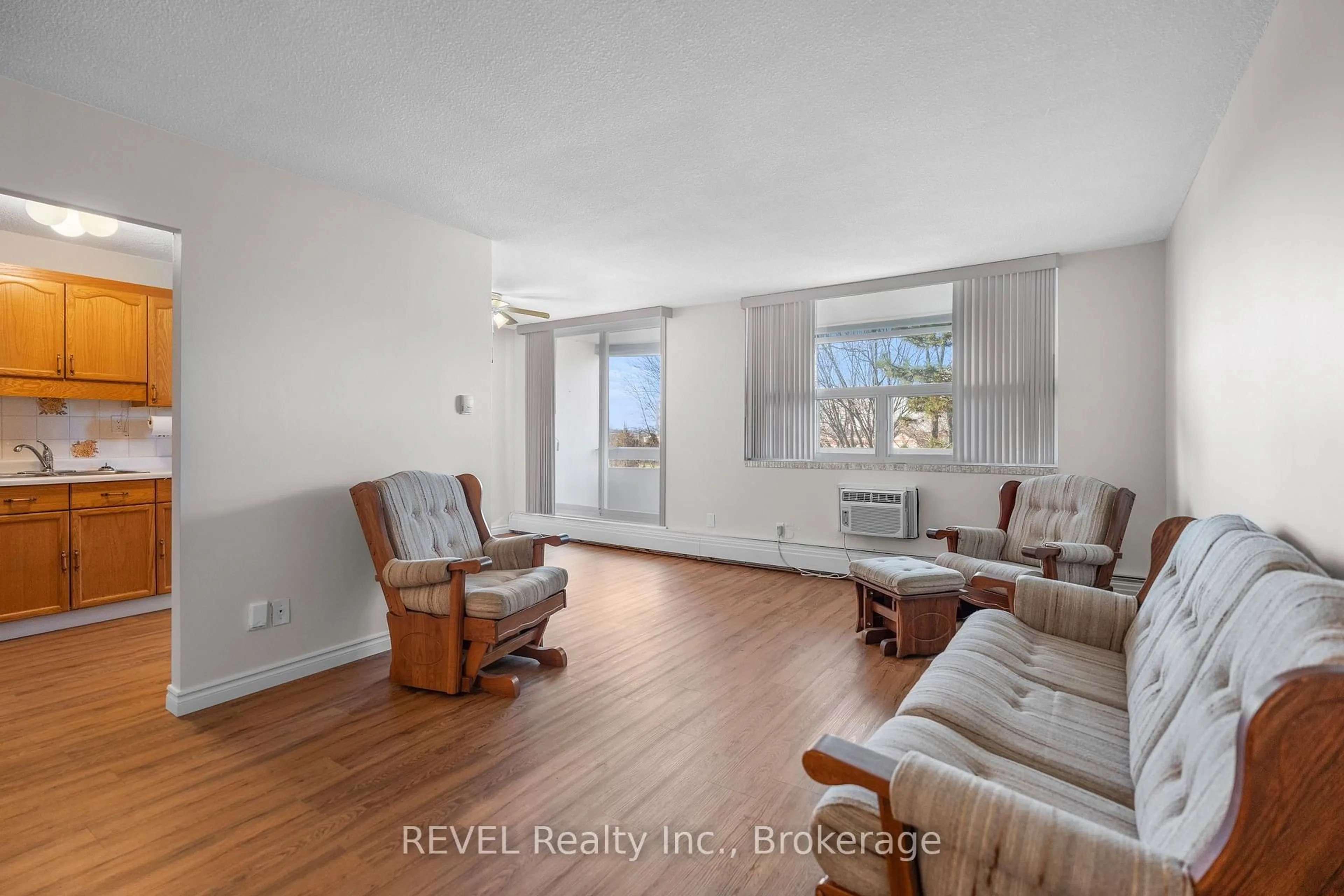 Living room with furniture, unknown for 365 Geneva St #411, St. Catharines Ontario L2N 5S7