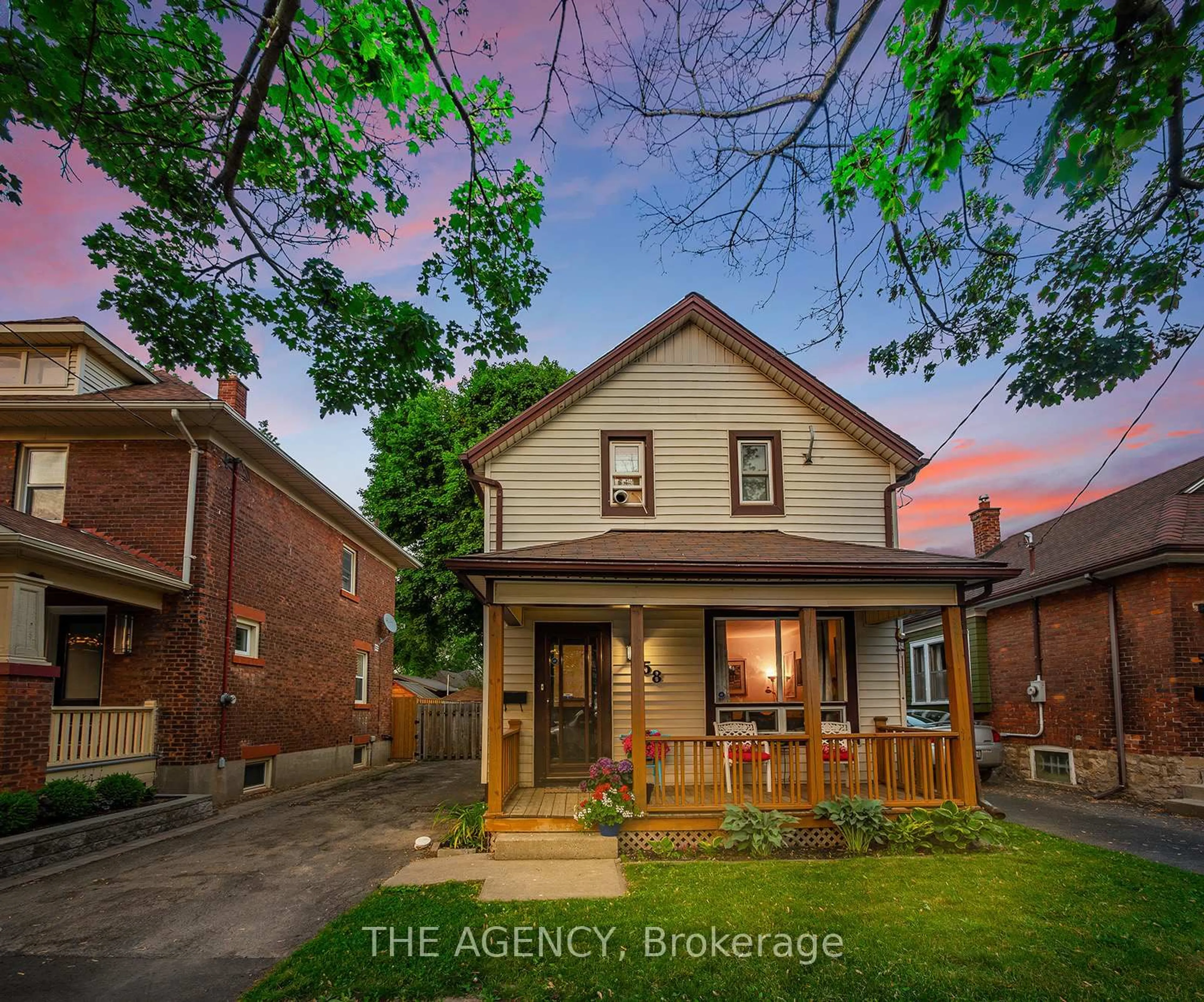 Home with brick exterior material, street for 58 Woodland Ave, St. Catharines Ontario L2R 5A3