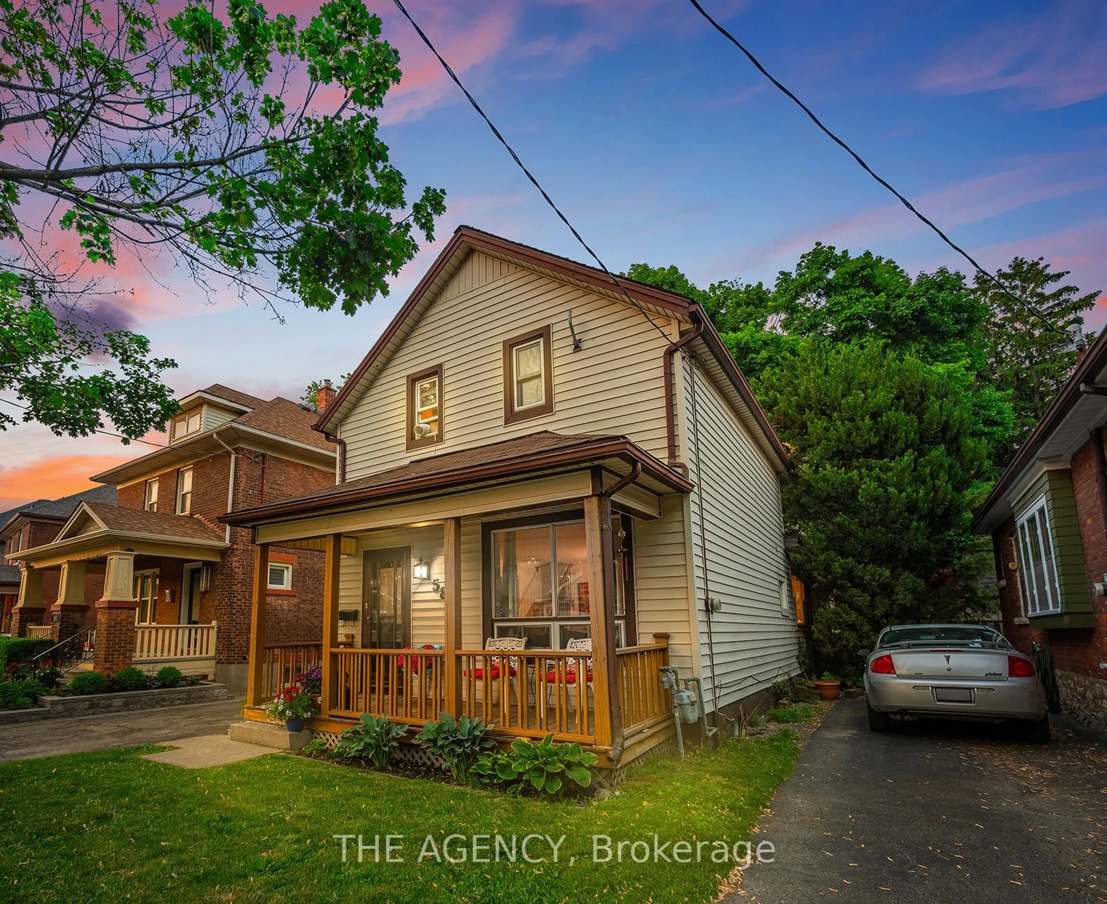 A pic from outside/outdoor area/front of a property/back of a property/a pic from drone, street for 58 Woodland Ave, St. Catharines Ontario L2R 5A3