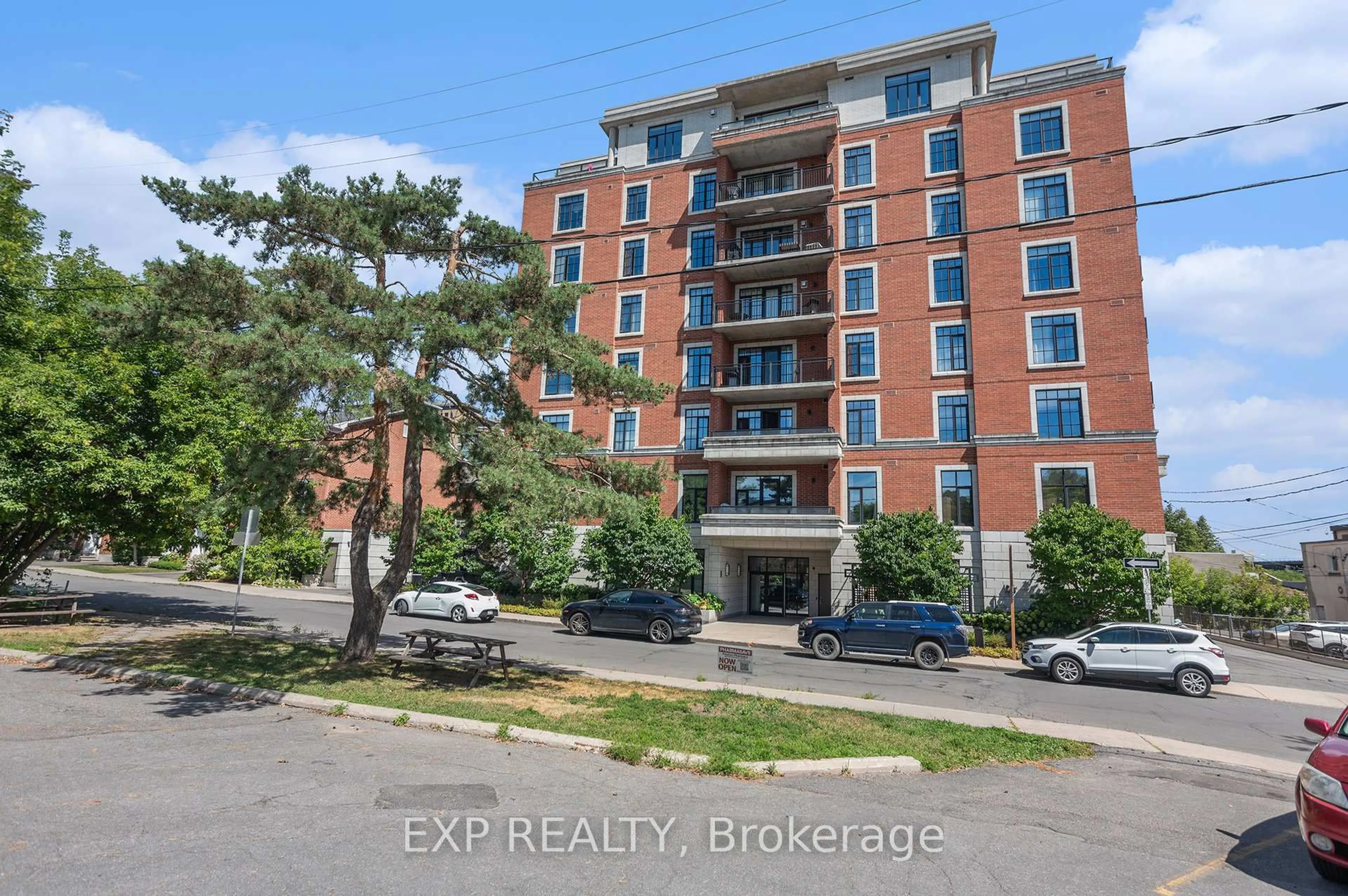 A pic from outside/outdoor area/front of a property/back of a property/a pic from drone, building for 327 Breezehill Ave #403, Ottawa Ontario K1Y 1R6